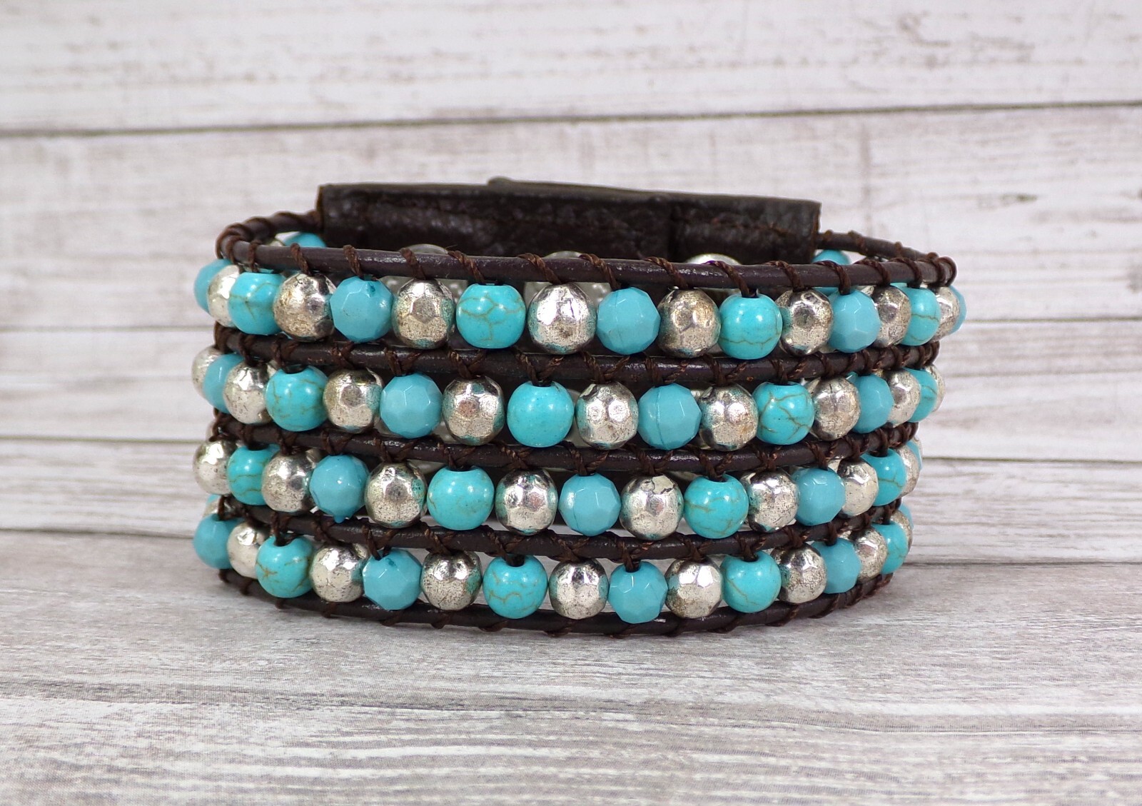 Wide turquoise and silver beaded leather bracelet , snap closure, brown leather