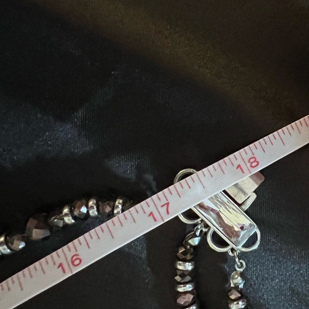 GUC- Iridescent beautiful 3 strand necklace with a fold over clasp.