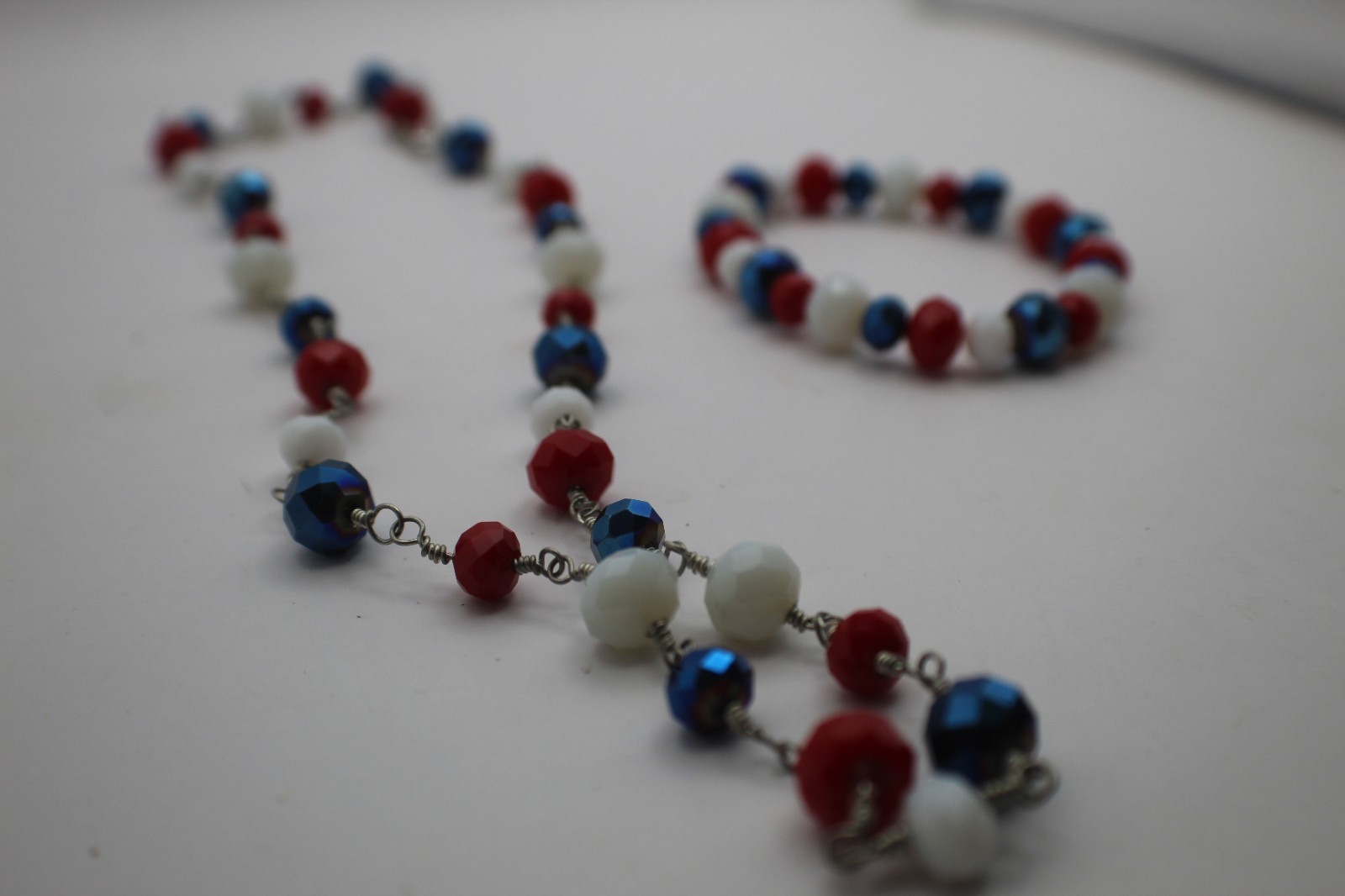 Red White And Blue Beaded Necklace With Matching Earrings And Bracelet.