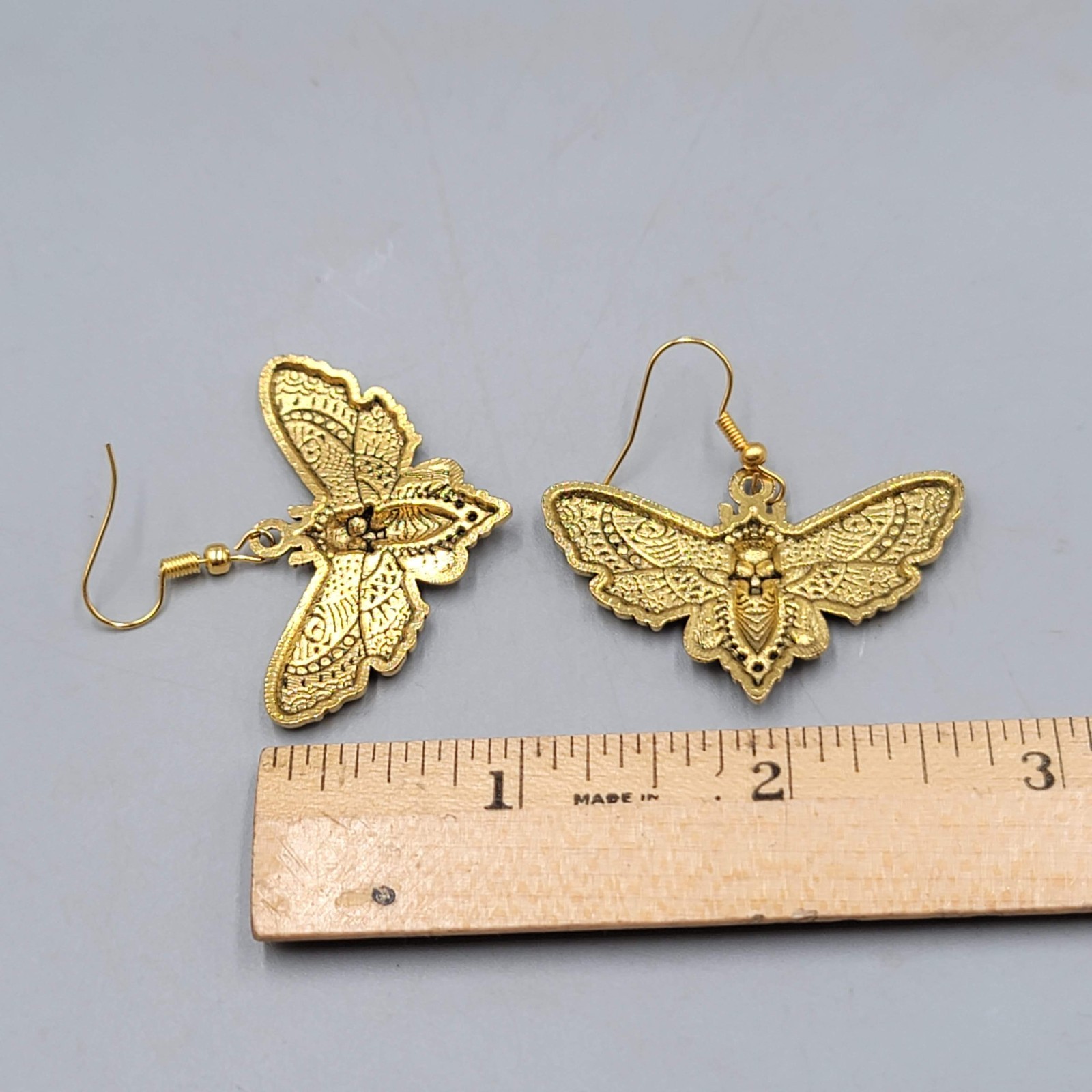 Moth Gold tone Embossed Pierced Earrings Dangle Goth Rock Punk 1 5/8″ x 1 in