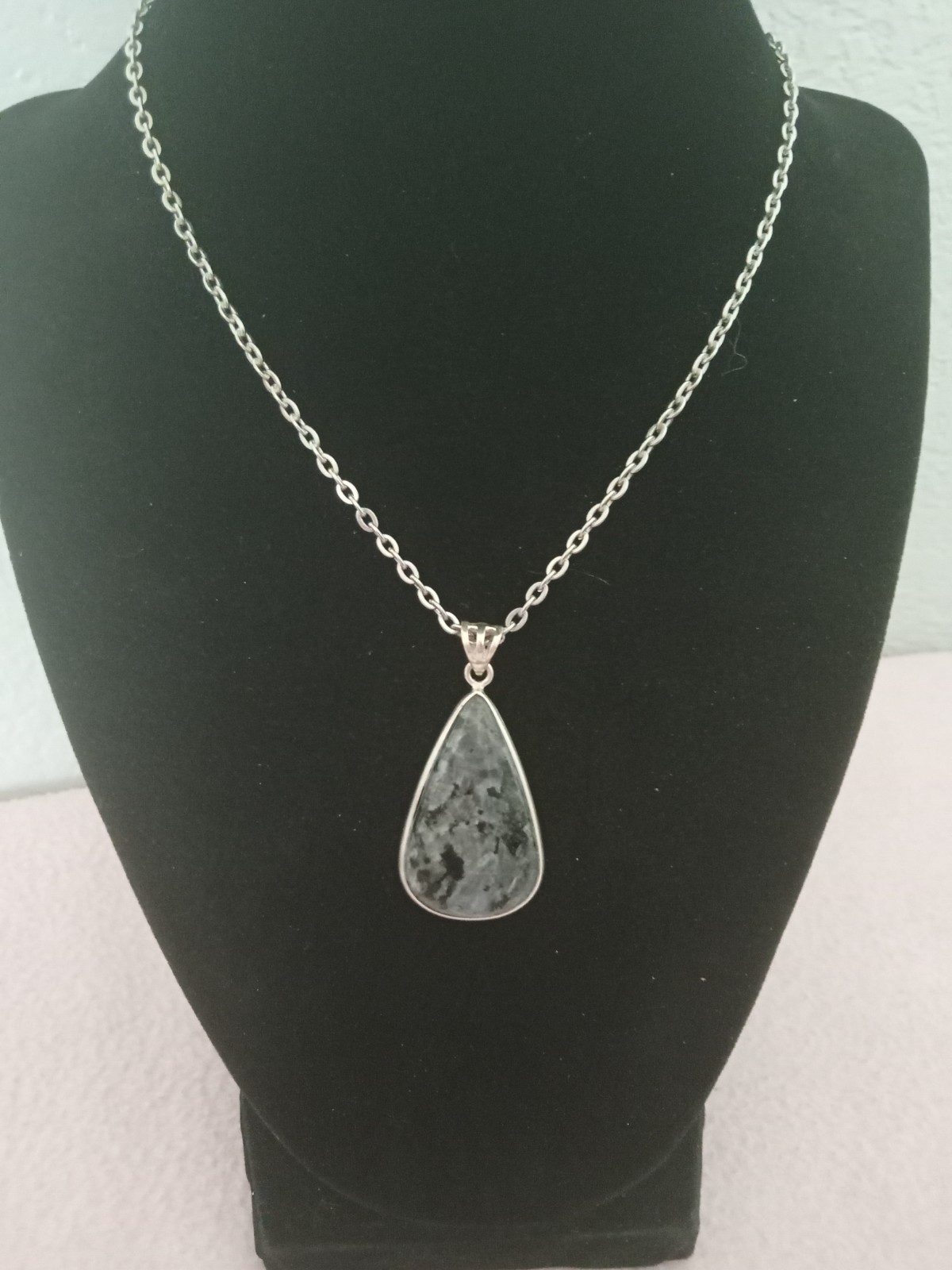 Beautiful Blue Reflective Teardrop Stone Pendant set in silver with chain