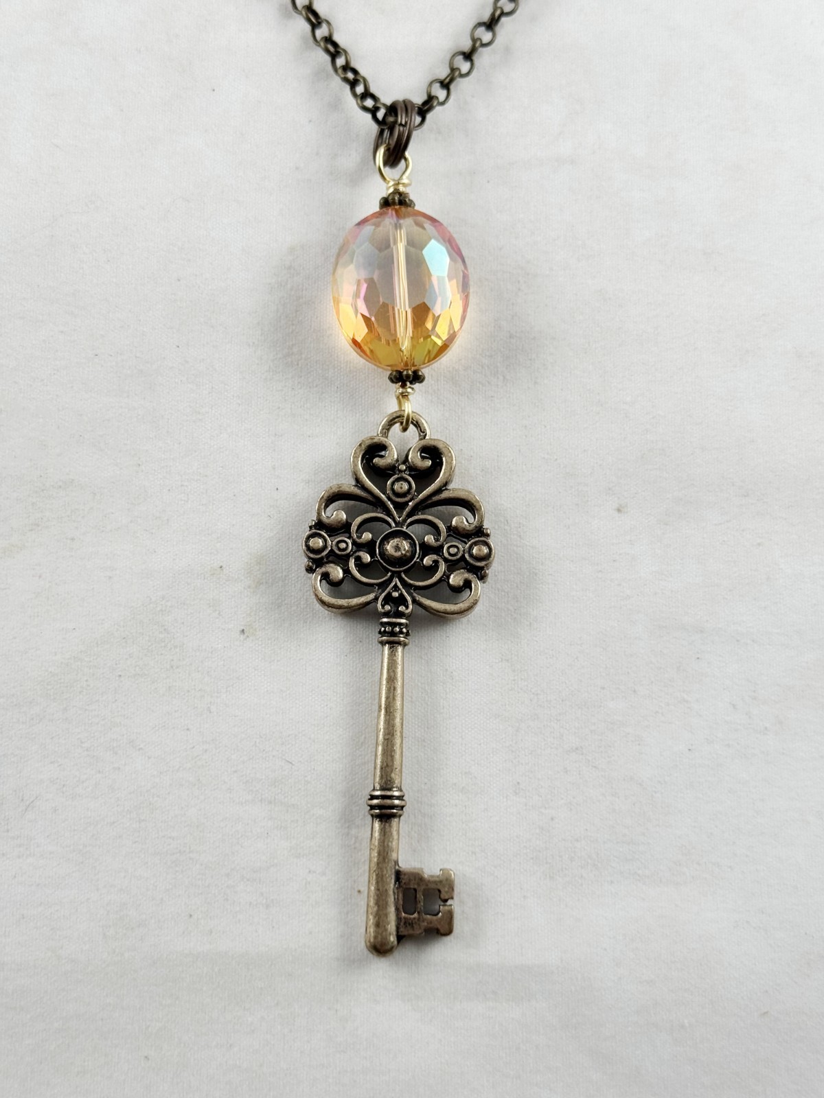Antique bronze color chain necklace with Amber crystal and ornate key