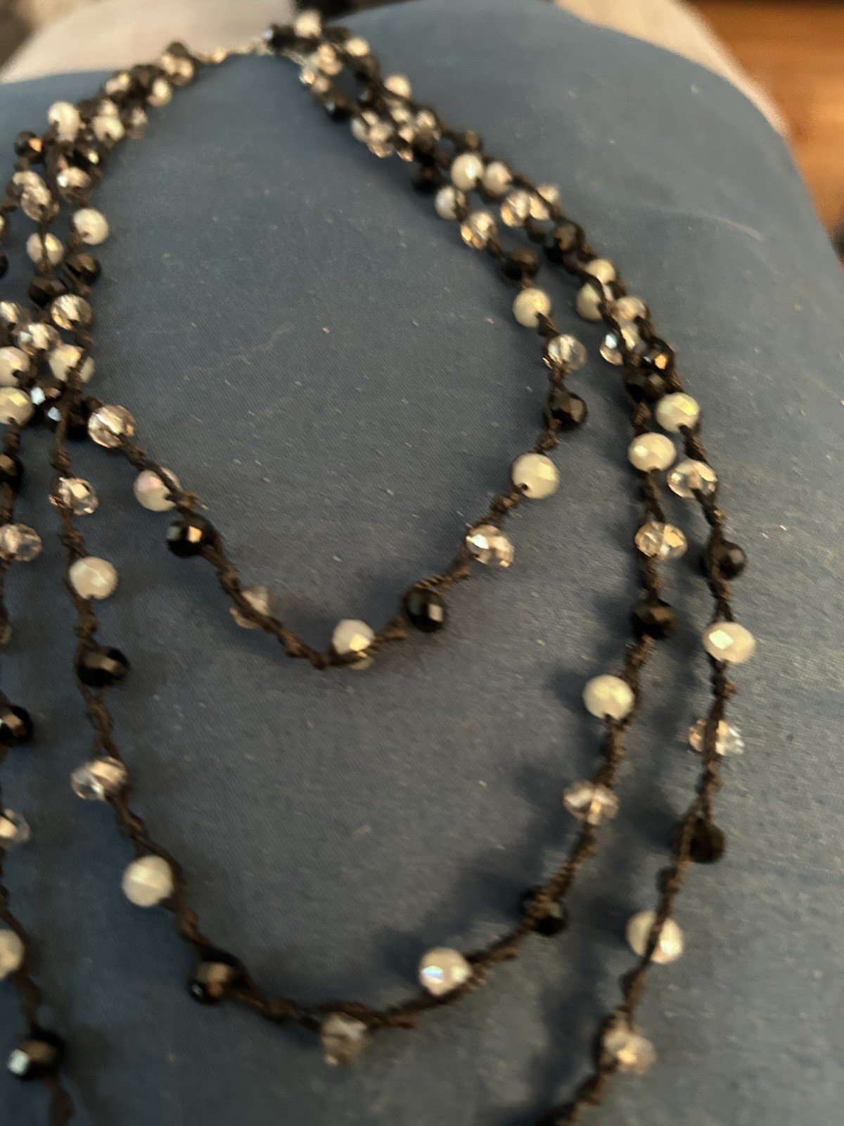 Irredescent Black, White, And Clear Beaded 3 Tiered Necklace On Nylon. 18 Inches