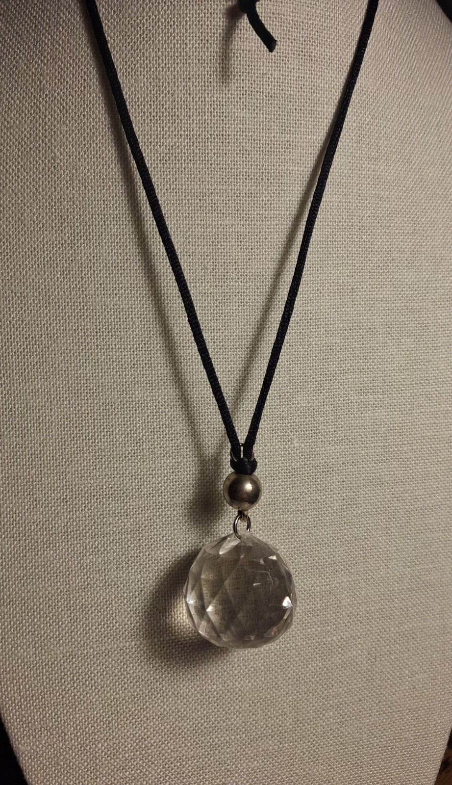 No brand glass or acrylic faceted clear ball w/black knotted cord necklace