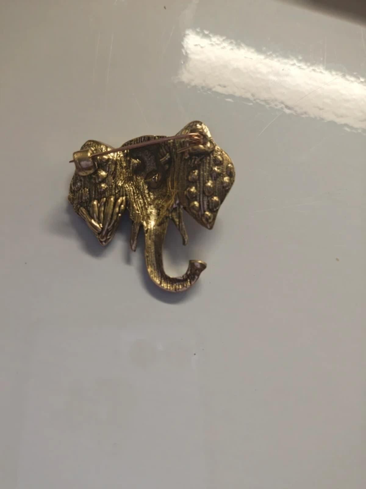 Elephant face brooch