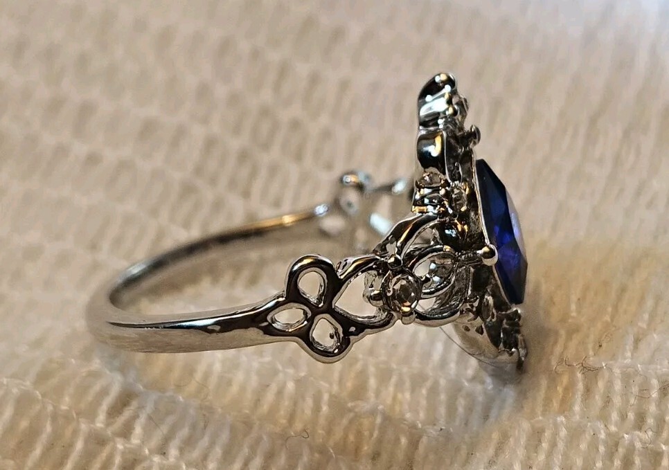 Silver Plated Delicate Noble Pattern Ring with Synthetic Sapphire and Zircons