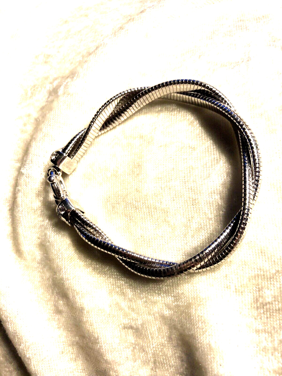 DIAMONIQUE CZ ITALIA TUBOGAS TWISTED SS BRACELET, SIZE SM/MED (M4616-42)