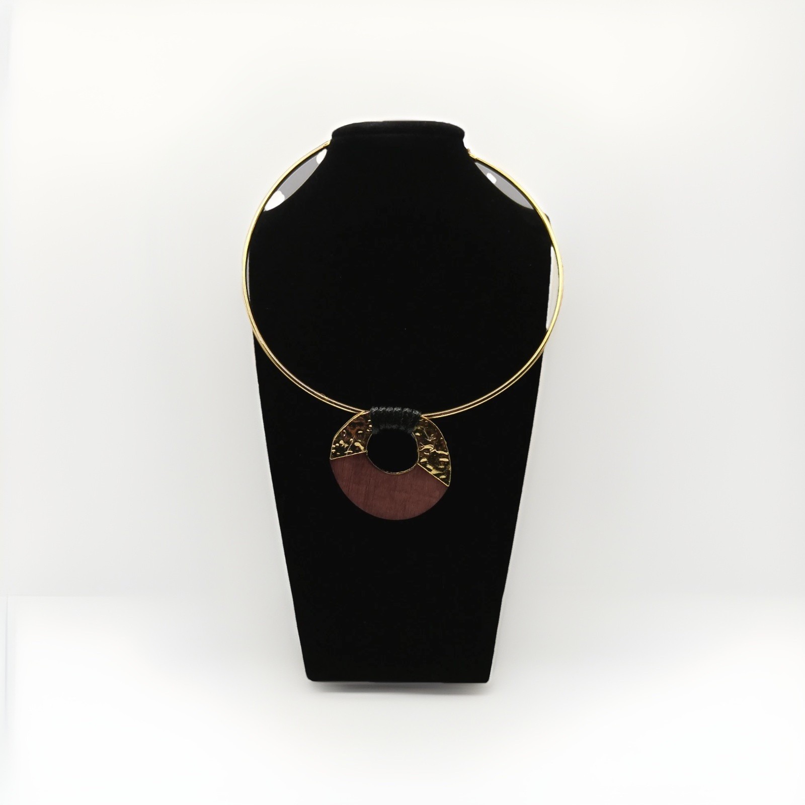 Gold-tone metal collar choker necklace with circular pandant