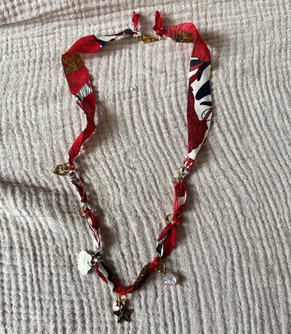 Handmade bandana necklace with charms. 5 charms included.