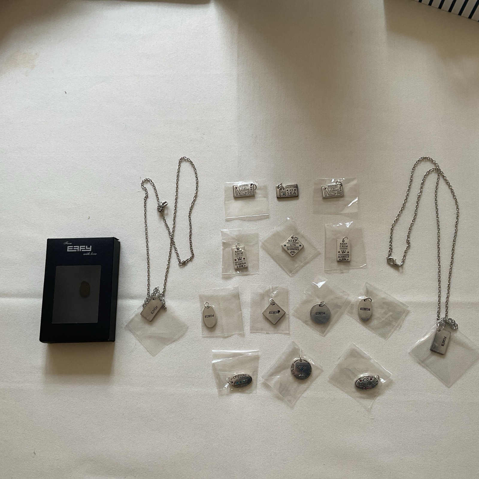 Effy with Love: 2 x Necklaces & 15 Charms in silver colour – Brand New