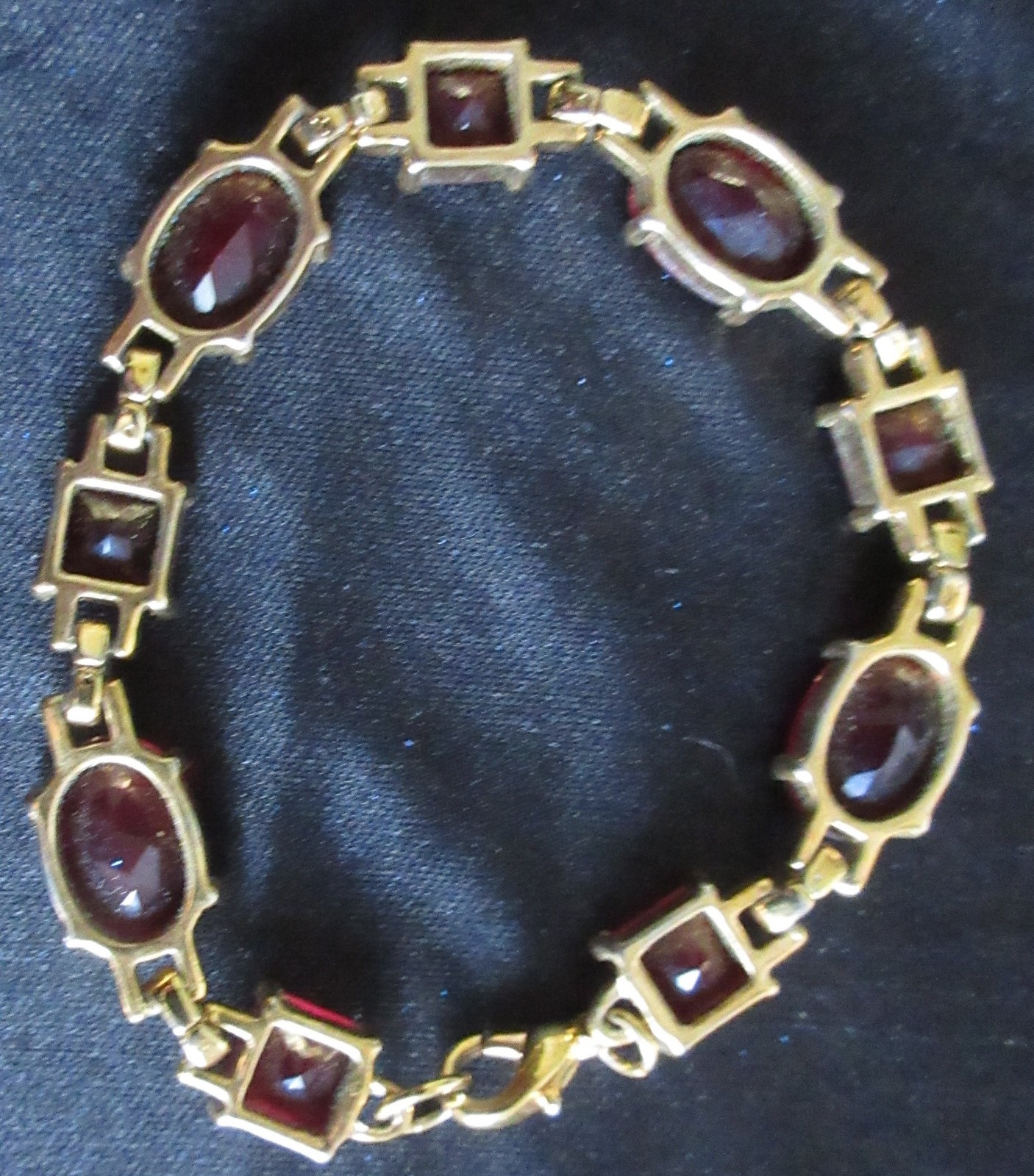 Bracelet Red Faceted Square and Oval Stones Open in Back Lobster Claw Closure