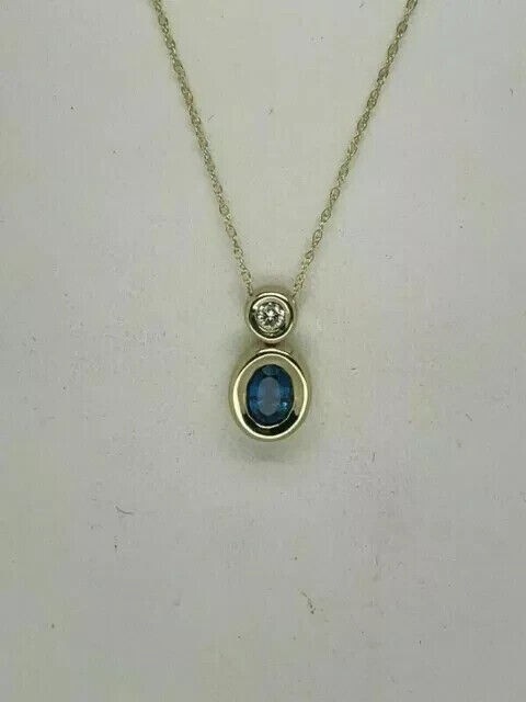 925 Sterling Silver Oval Cut Simulated Sapphire Pendant 14K Yellow Gold Plated