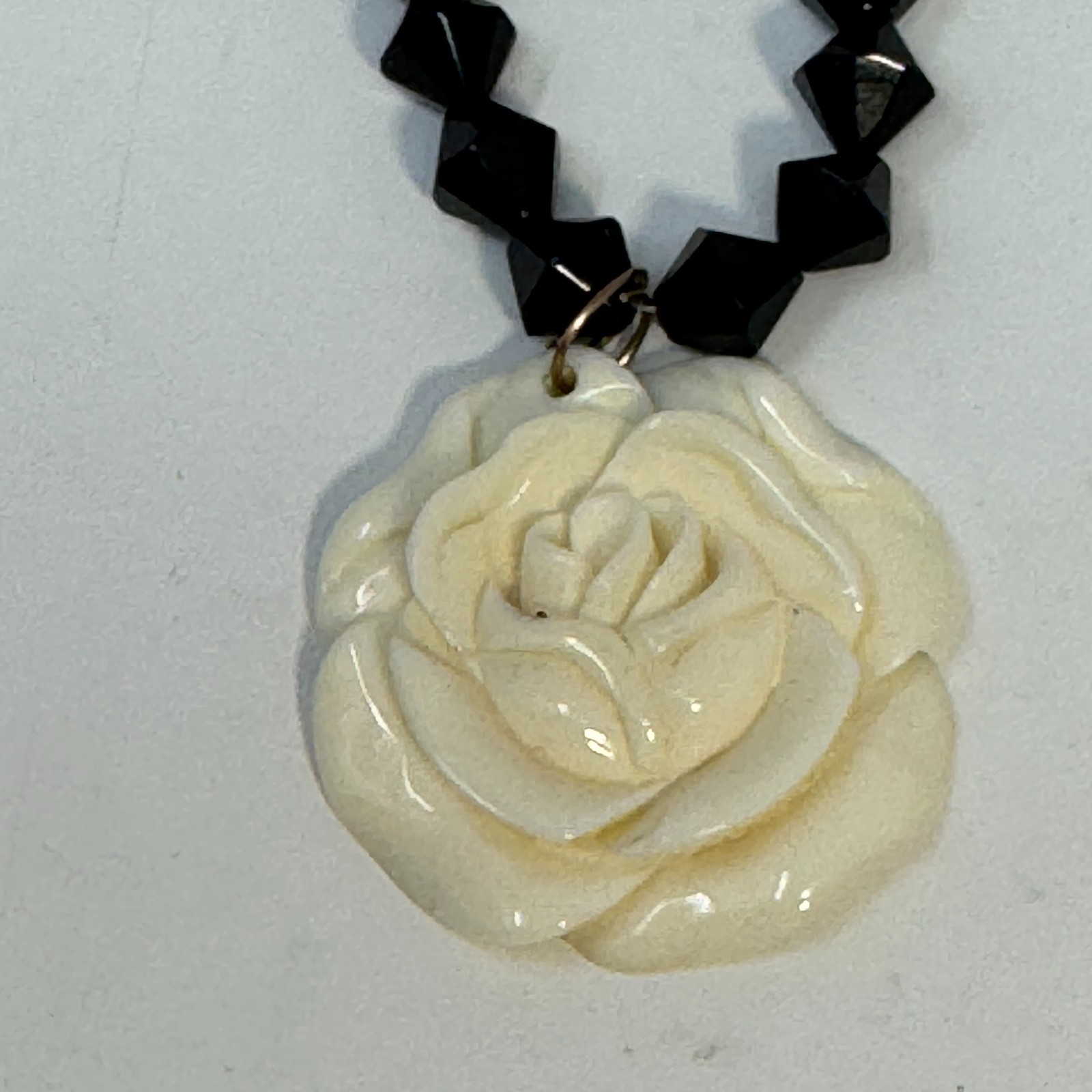 Vintage 60s Black Bicone Bead Necklace Ivory White Carved Resin Rose Pendant Set