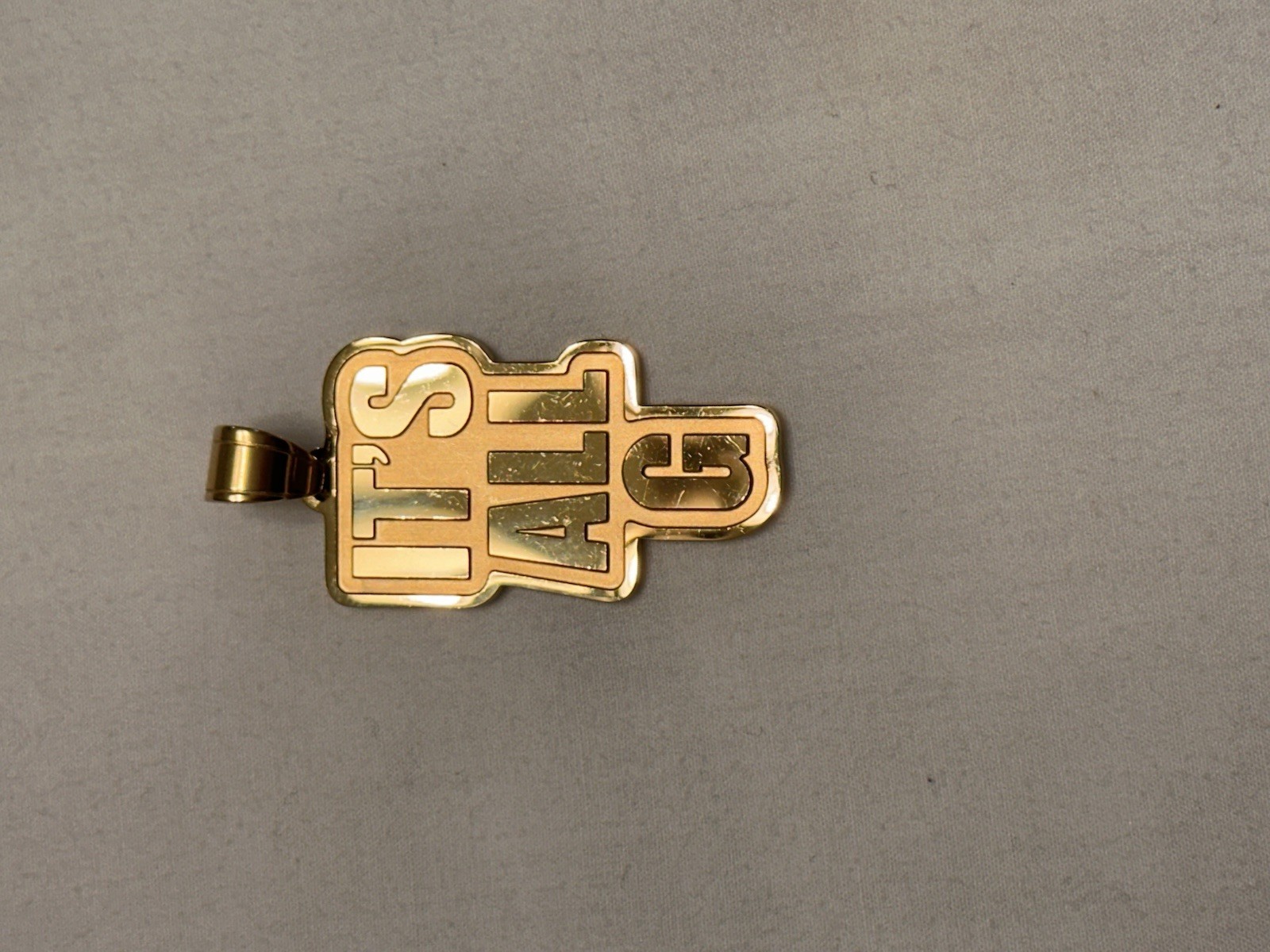 “Simone I. Smith Celebrity 50 years of Hip Hop pendant”