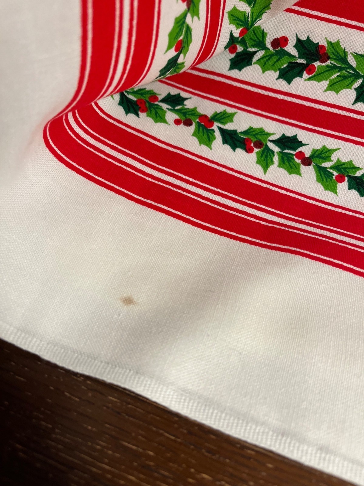Vintage Holiday Green and Red Holly Tablecloth 52×68 In A587, some small stains