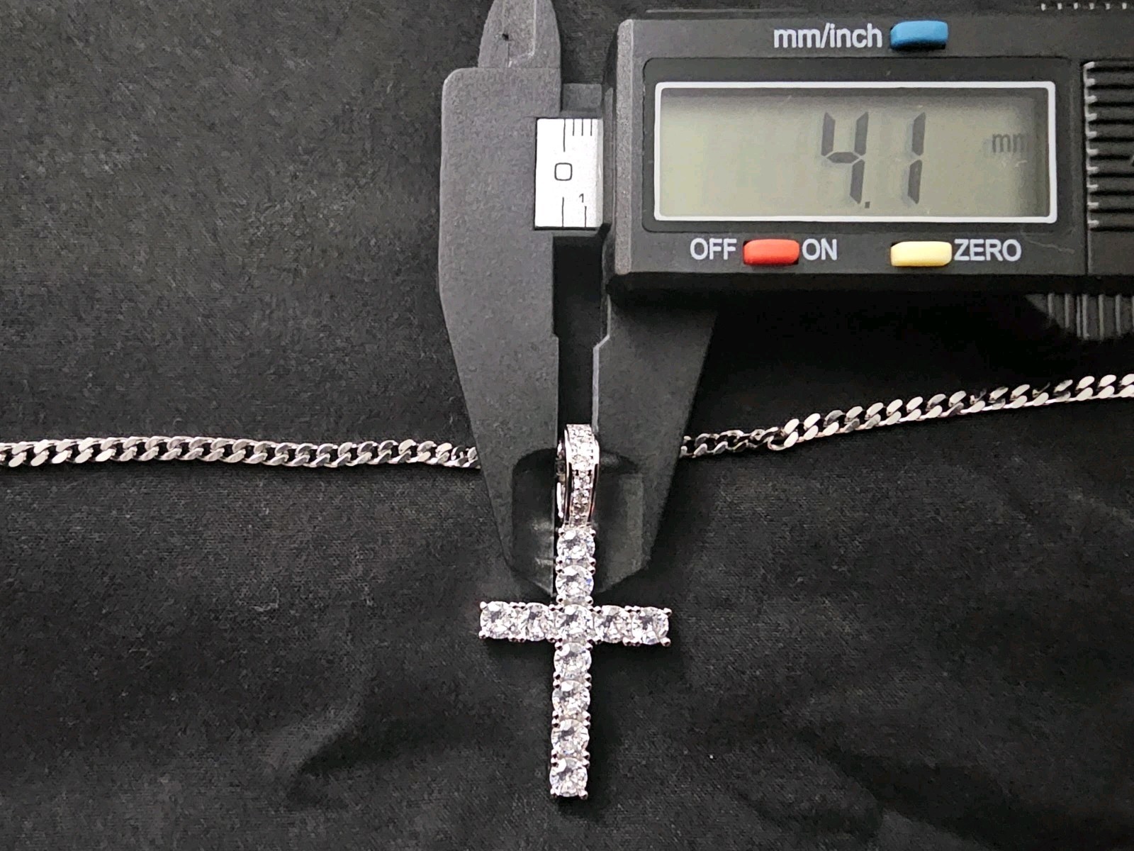 20in. 2.4mm stainless stl chain w/ a Silver plated Cross Pendant 11 prong set CZ