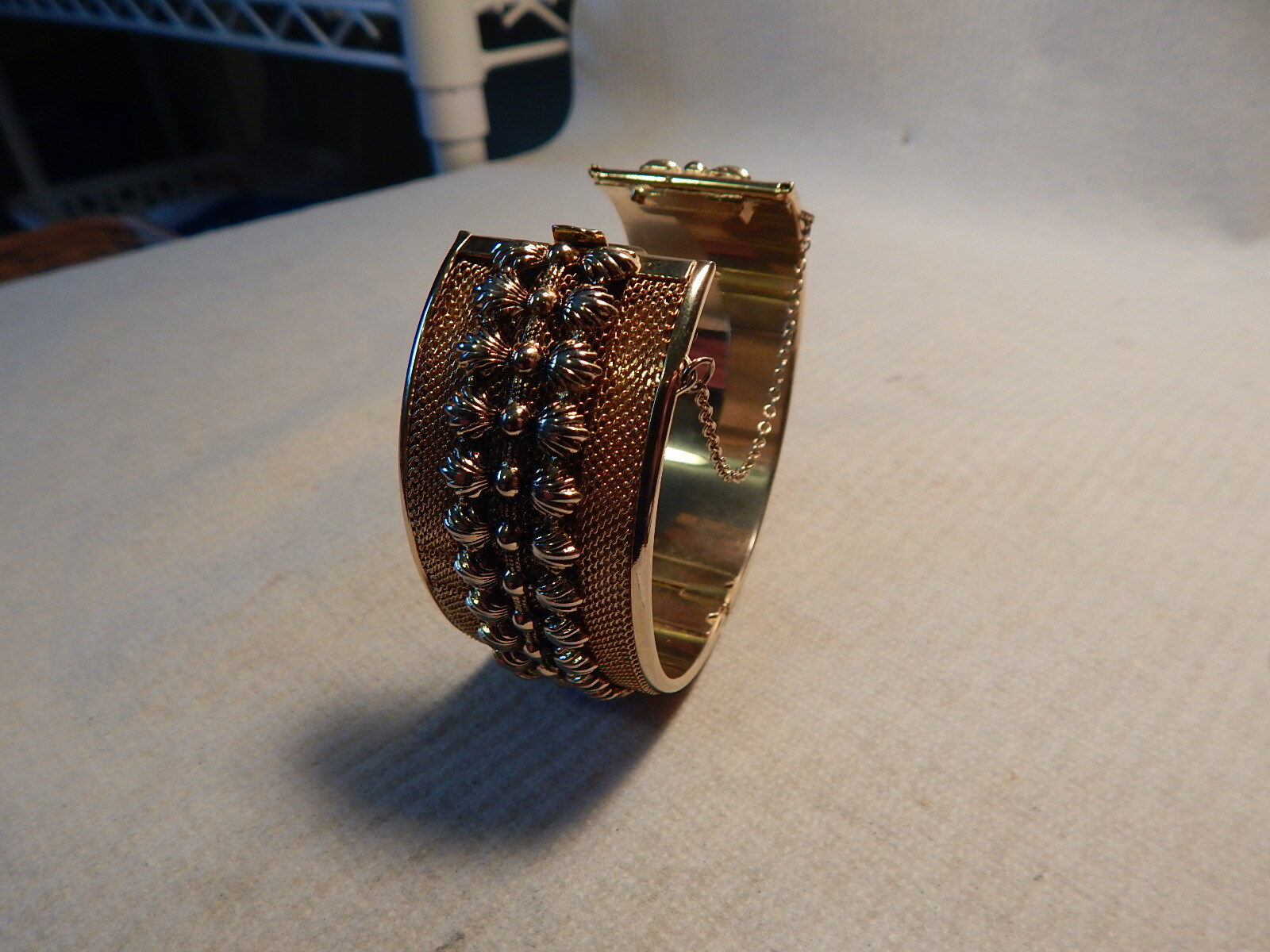 VTG 1950S 60S GOLD TONE CUFF BRACELET 11/4 WIDE MESH BASE RAISED DESIGN NO MARK