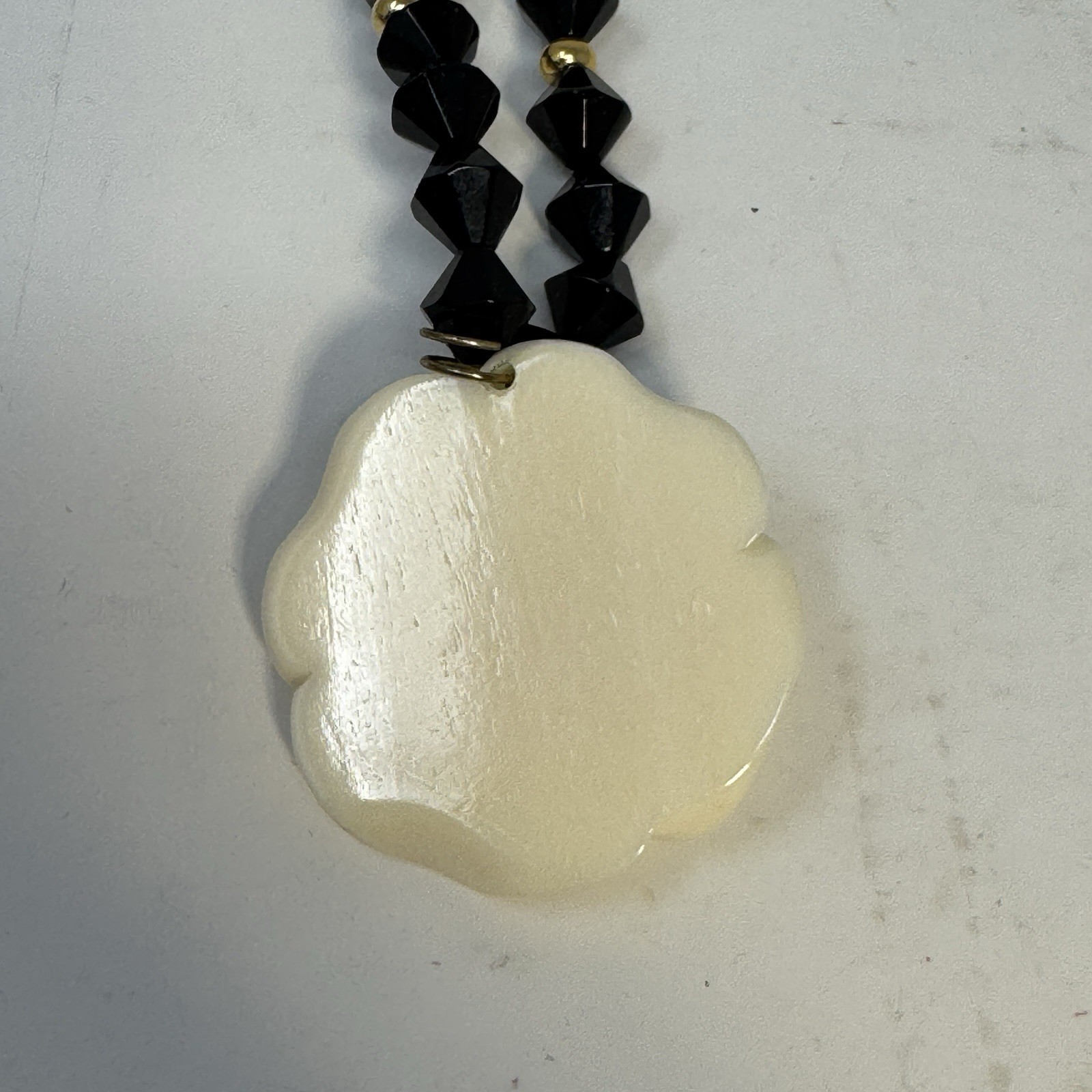 Vintage 60s Black Bicone Bead Necklace Ivory White Carved Resin Rose Pendant Set