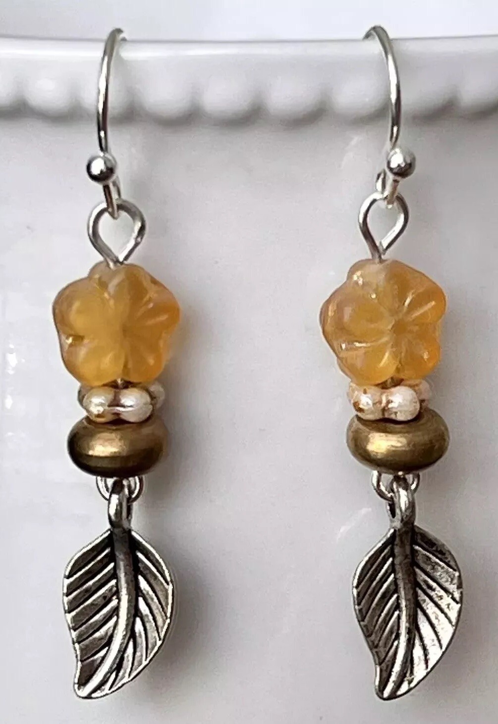 Beautiful Mixed Metal Golden Amber Flower with Silver Leaf Earrings. Bloom