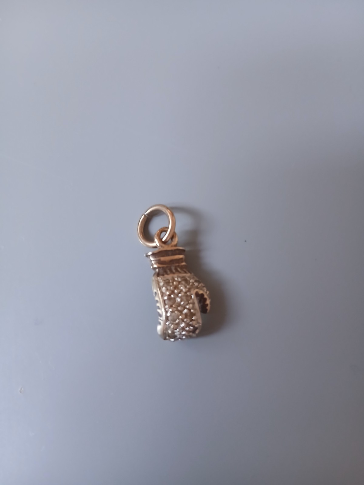 9ct solid gold 1980s boxing glove with cubic zirconia pendant