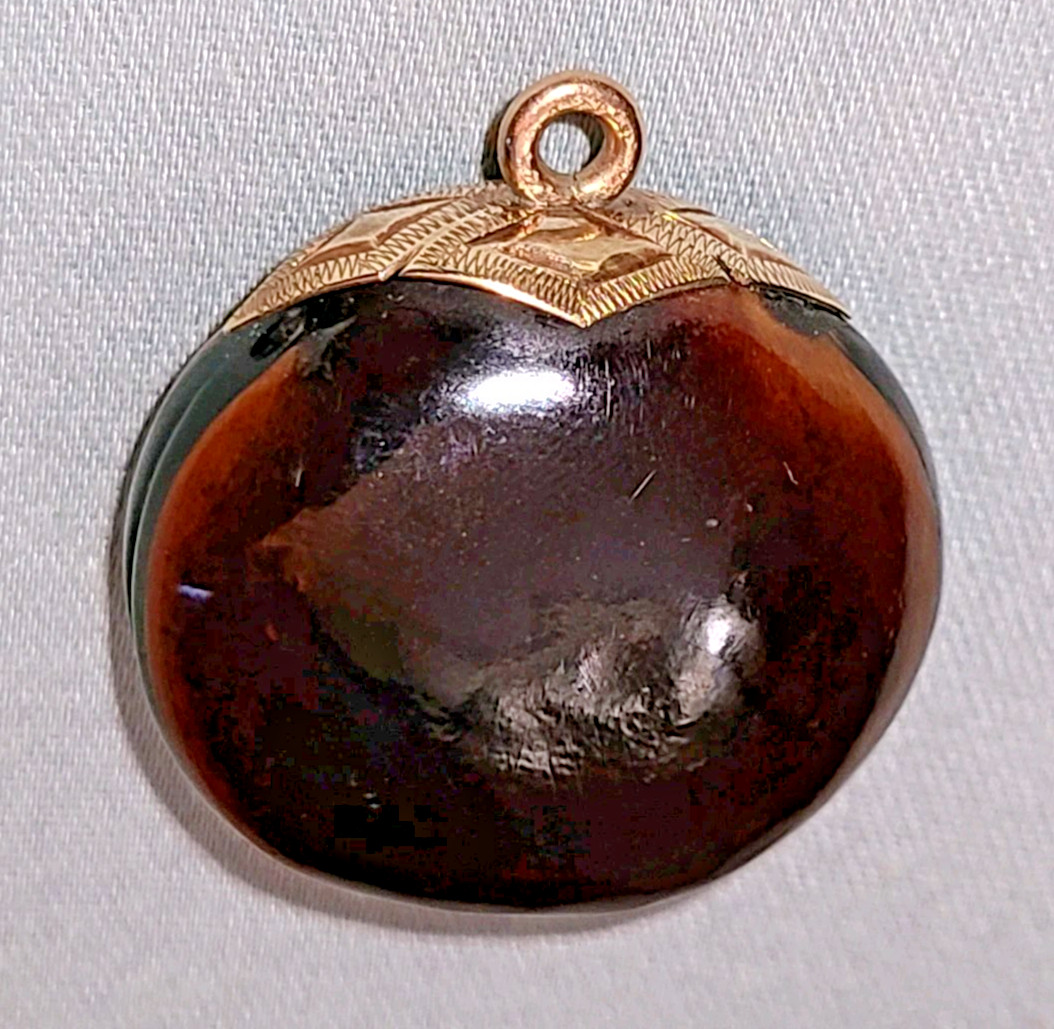 Antique Victorian polished mucuna / sea bean pendant, gold tone bail