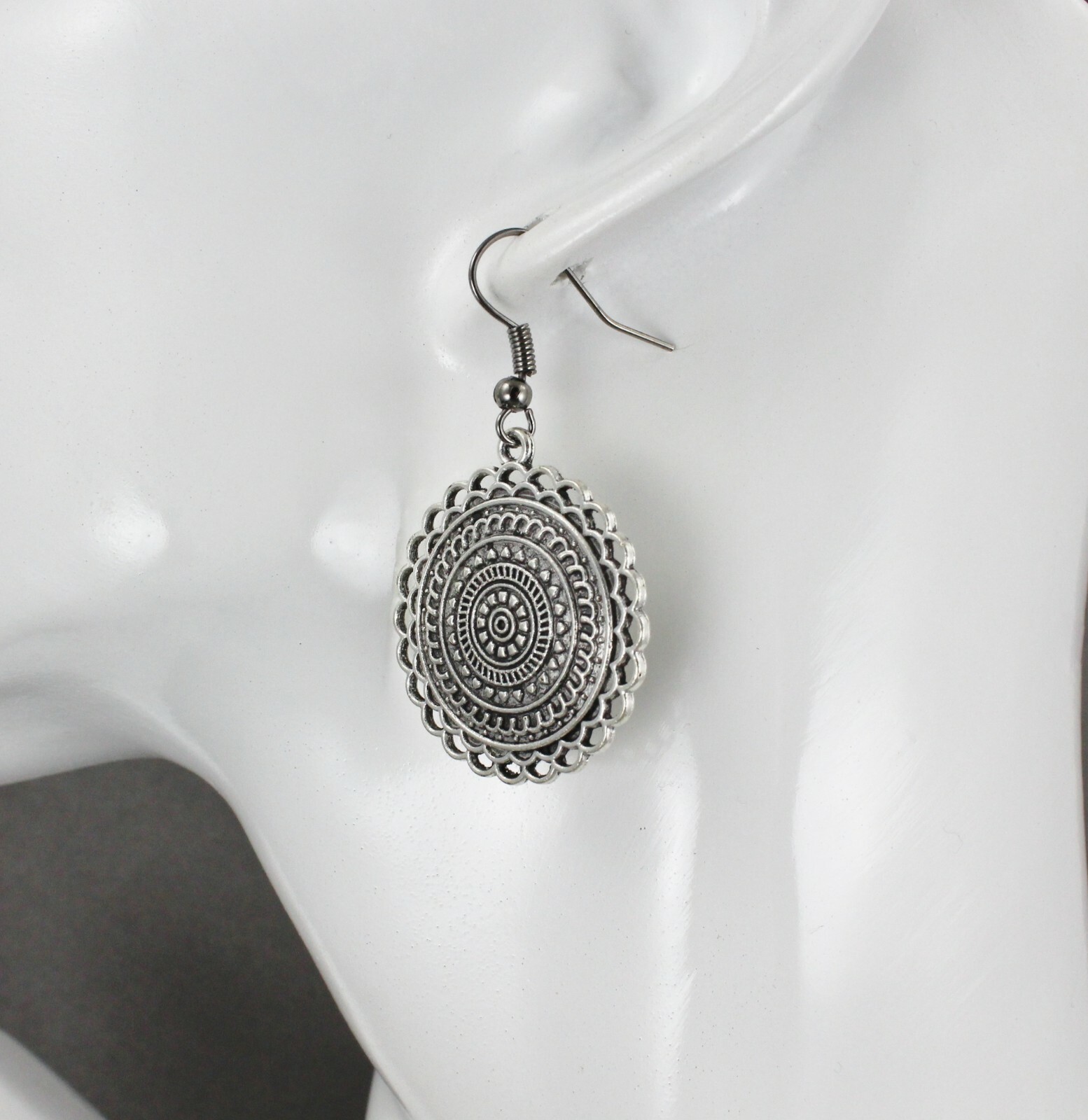 Silver stamped medallion dangle disc 1.75″ long earrings lightweight antiqued