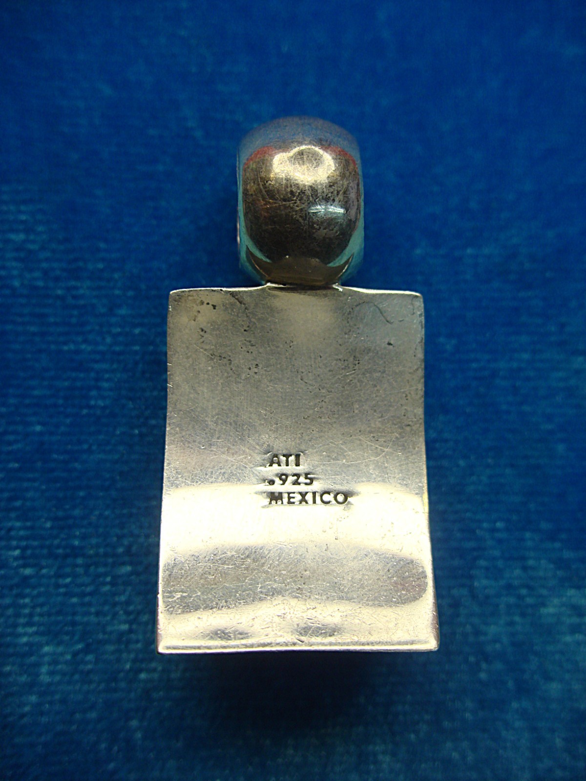 ATI MEXICO STERLING SILVER PENDANT WITH CURVED SETTING & BLUE/WHITE INSERT