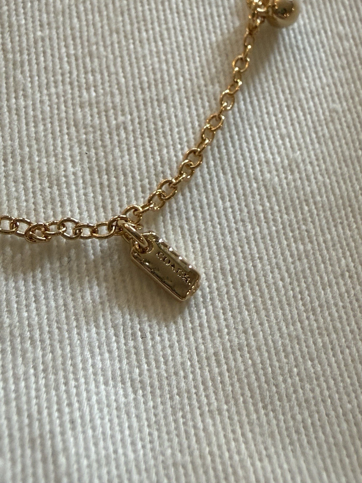 Coach Gold Tone Charm Bracelet NWT Heart Horseshoe Crystal Bracelet