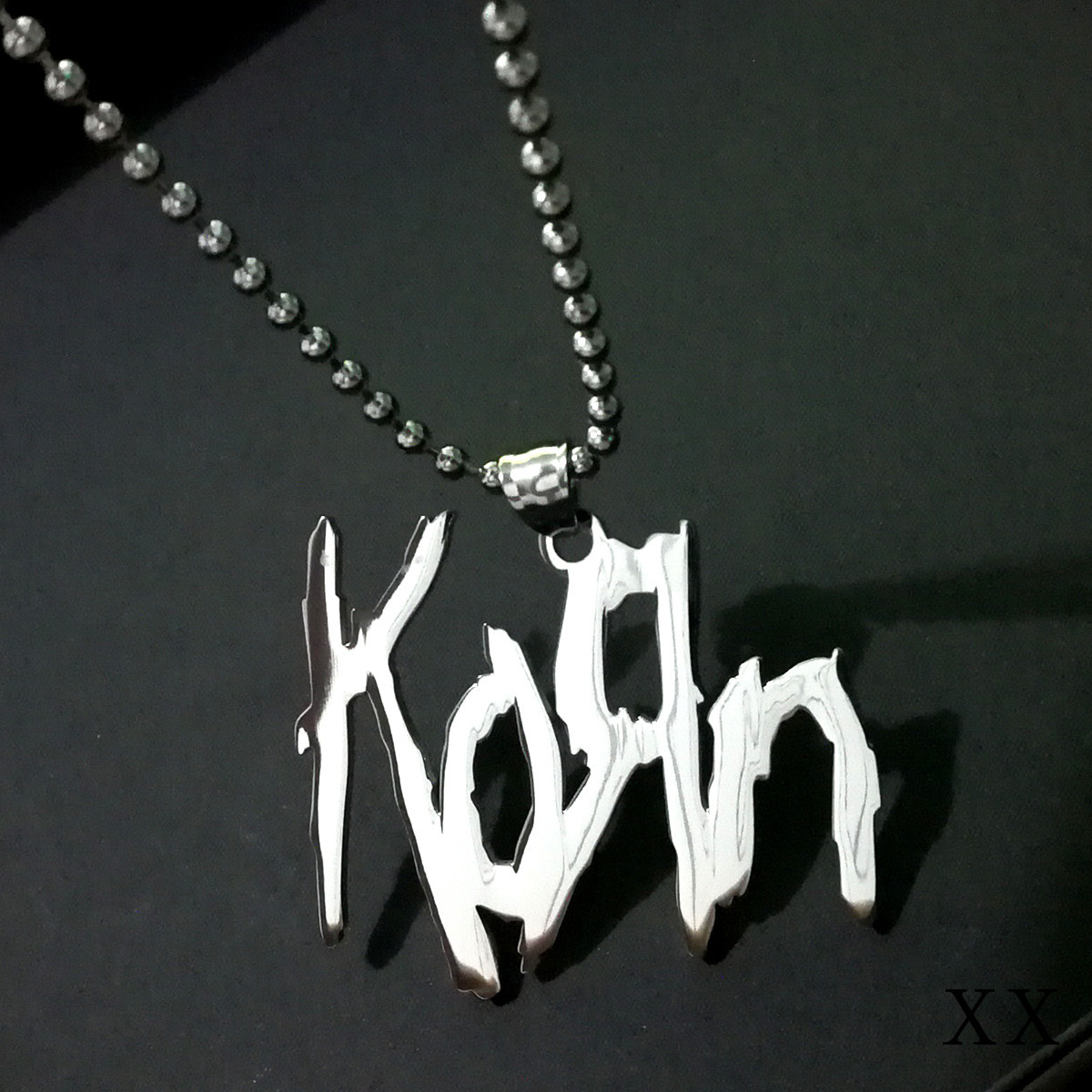 KORN polishing stainless steel pendant with a matching 30 inch ball chain