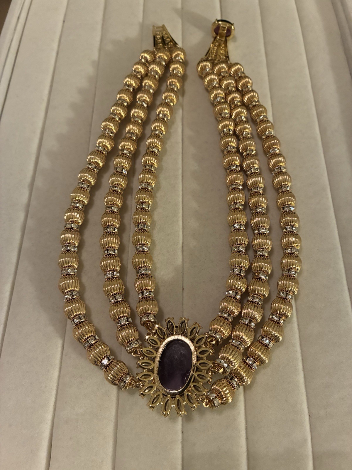 Catwalk Jon Gold Tone Triple Strand Beaded Necklace Oval Purple Pendant