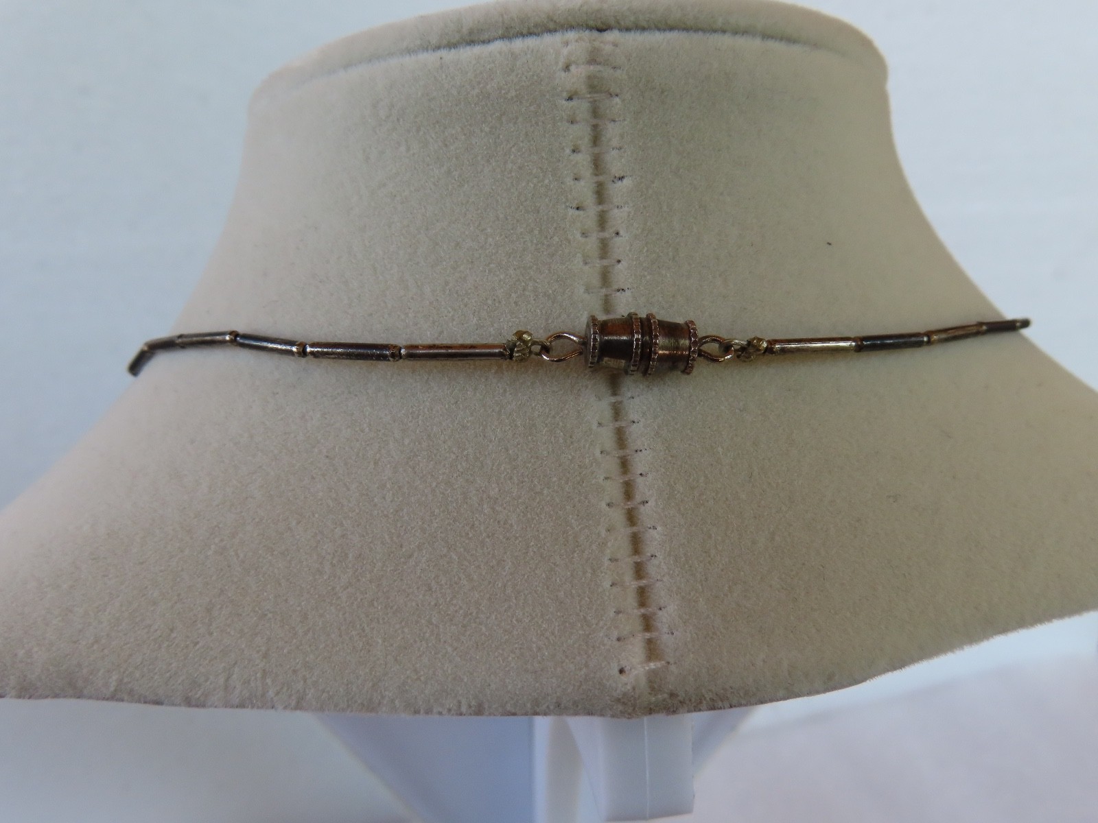 Black Beaded necklace, measures 18″ about.