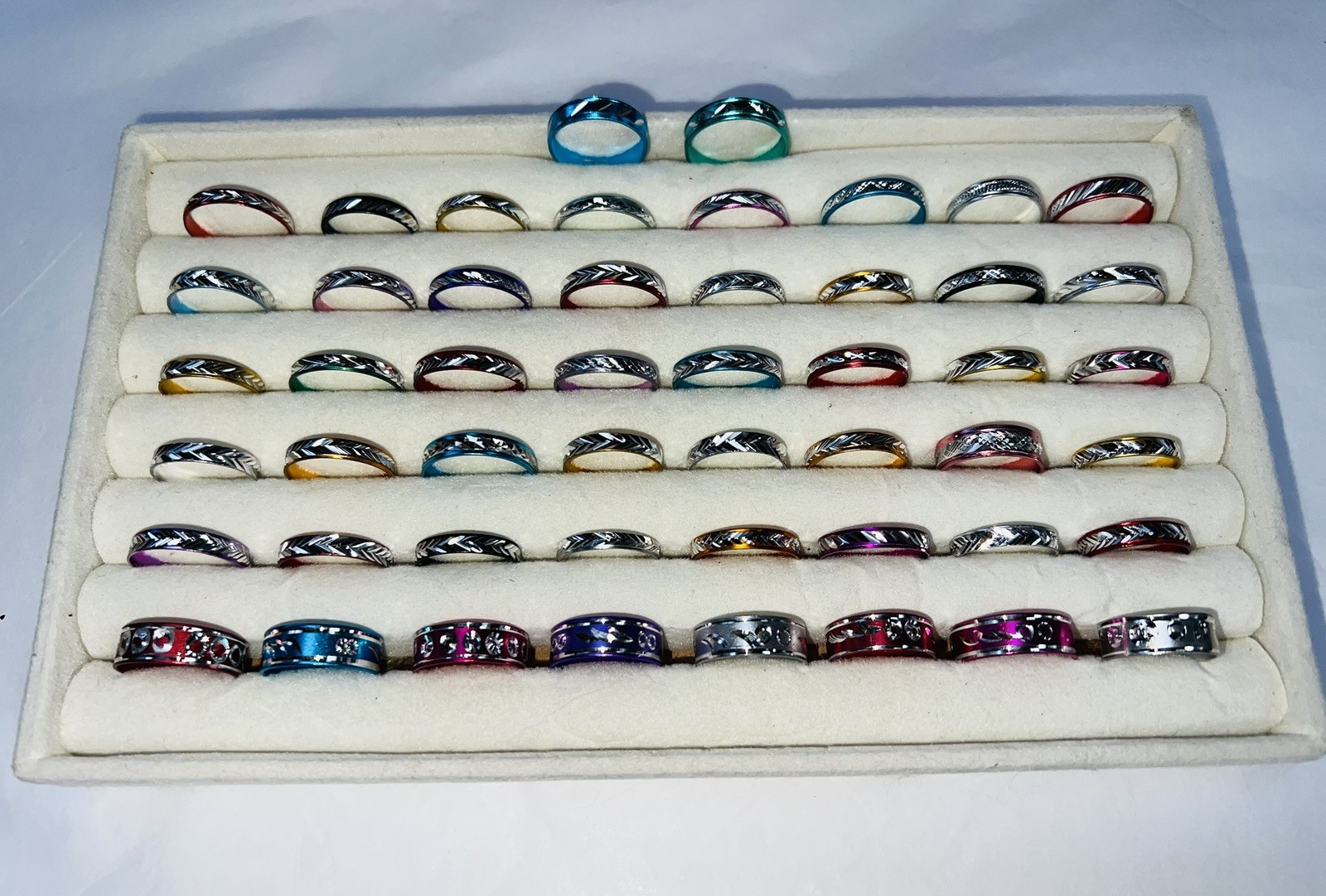 Bundle of 50 ALUMINIUM Silver Carved Different Coloured RINGS Mixed Sizes