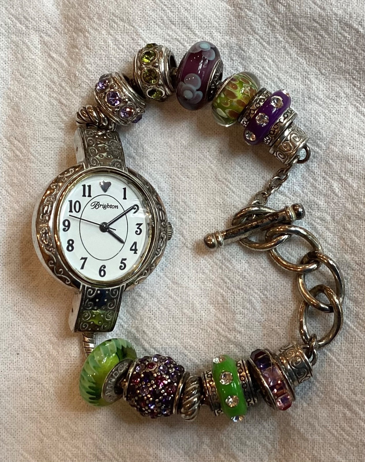 Brighton “Tustin” Silver Plated Watch with 11 Green and Purple Glass Beads