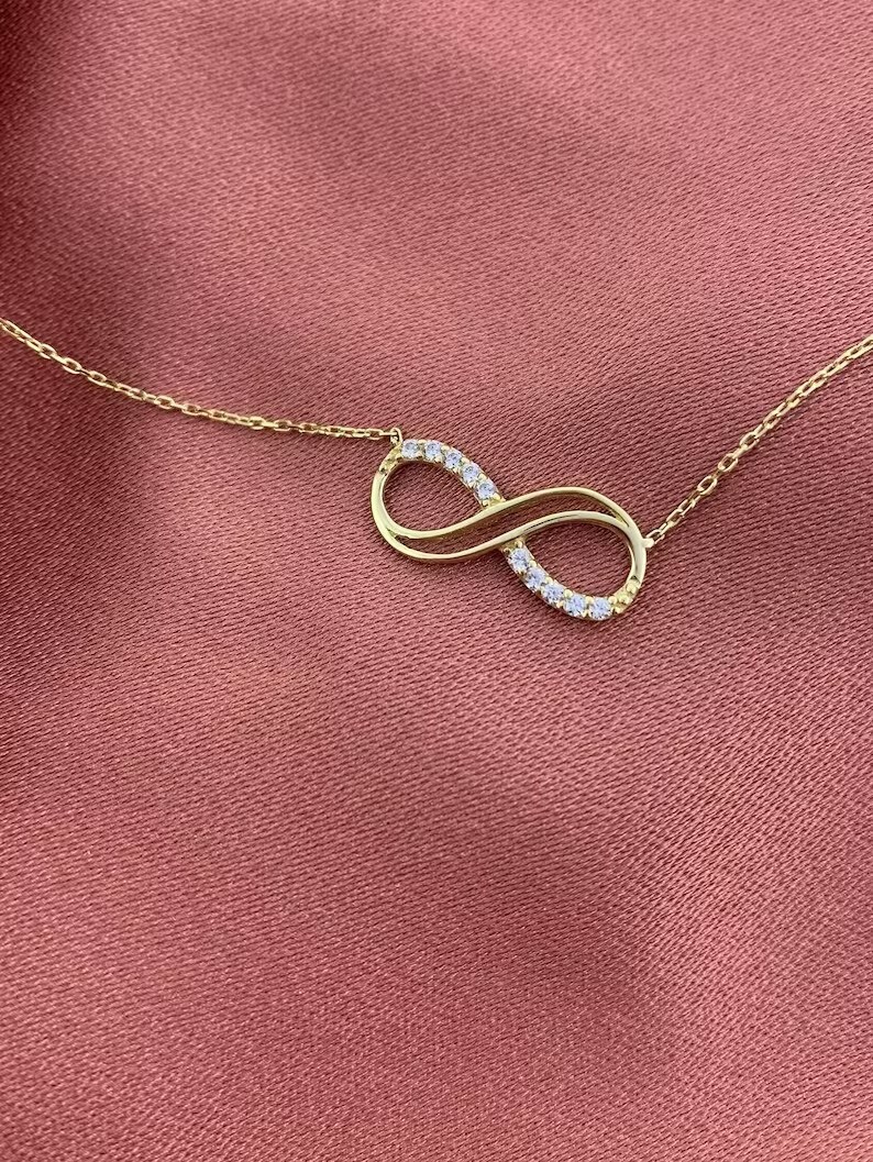Round Cut Simulated Diamond Stunning Infinity Pendant In 14K Yellow Gold Plated