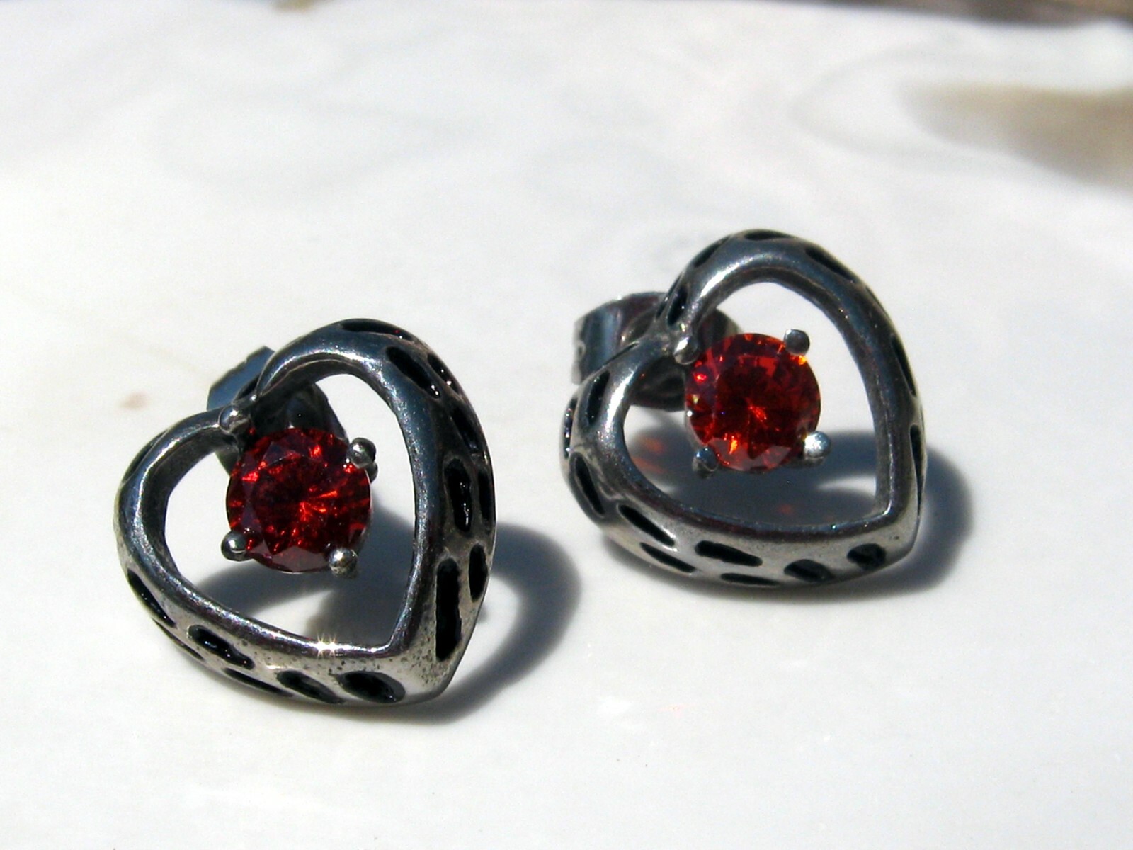 316L Surgical Steel Hollow Heart Earring With Red CZ Center Stone