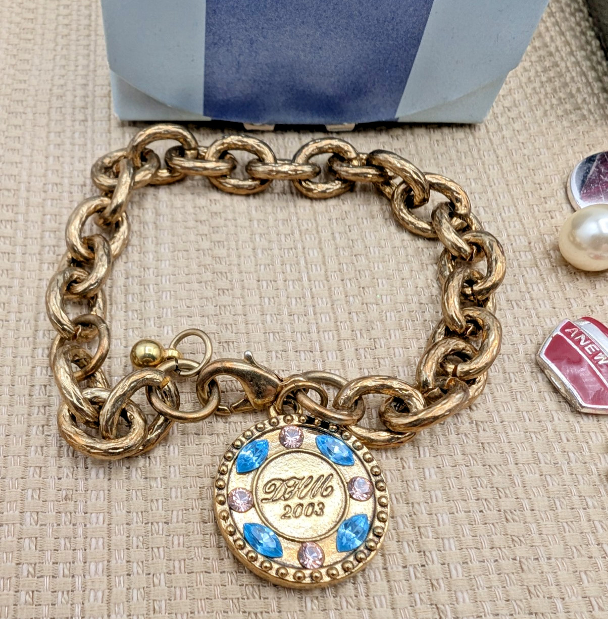 2 Avon Representative Charm Bracelet-125th Anniversary & David H McConnell Award
