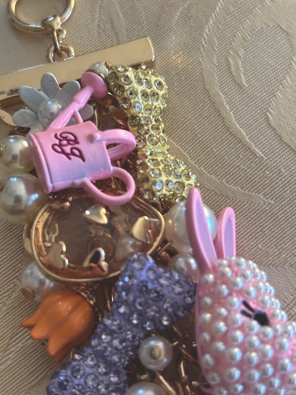 NEW Betsey Johnson Goldtone Easter Egg Bunny Tulip Bow Daisy Charm Bracelet