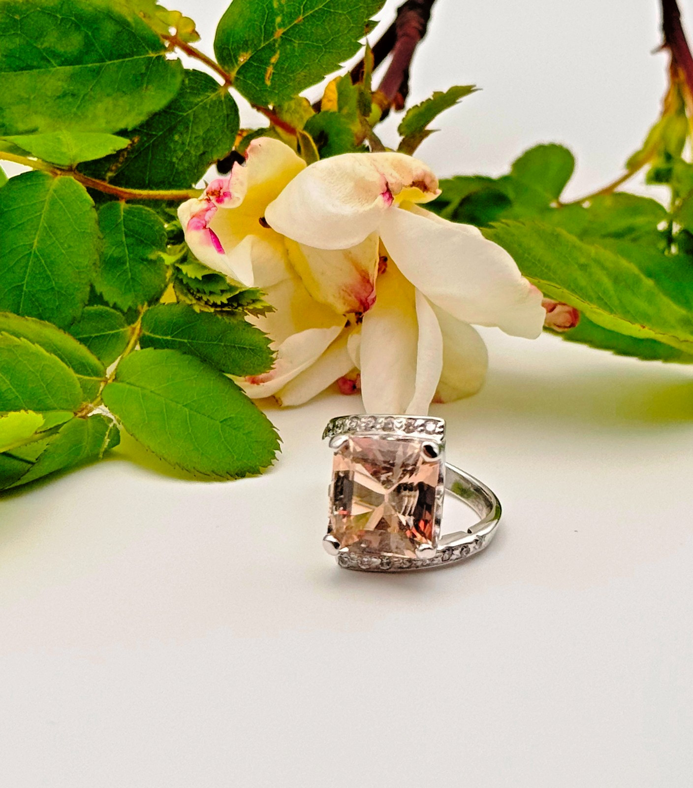 Emerald cut topaz paired with sparkling zircon, set in handcrafted 925