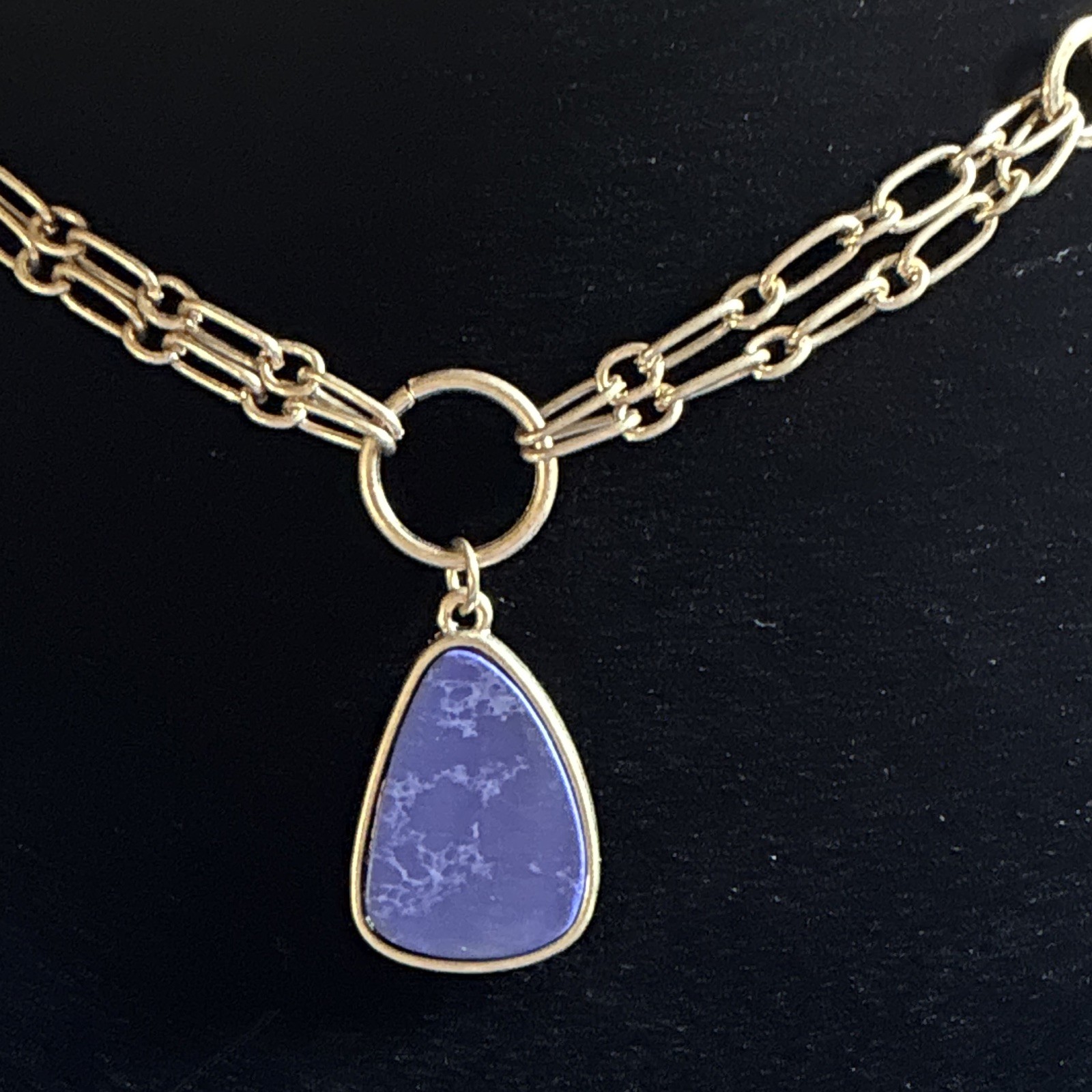 Gold chain necklace, and bracelet set with purple stone pendants