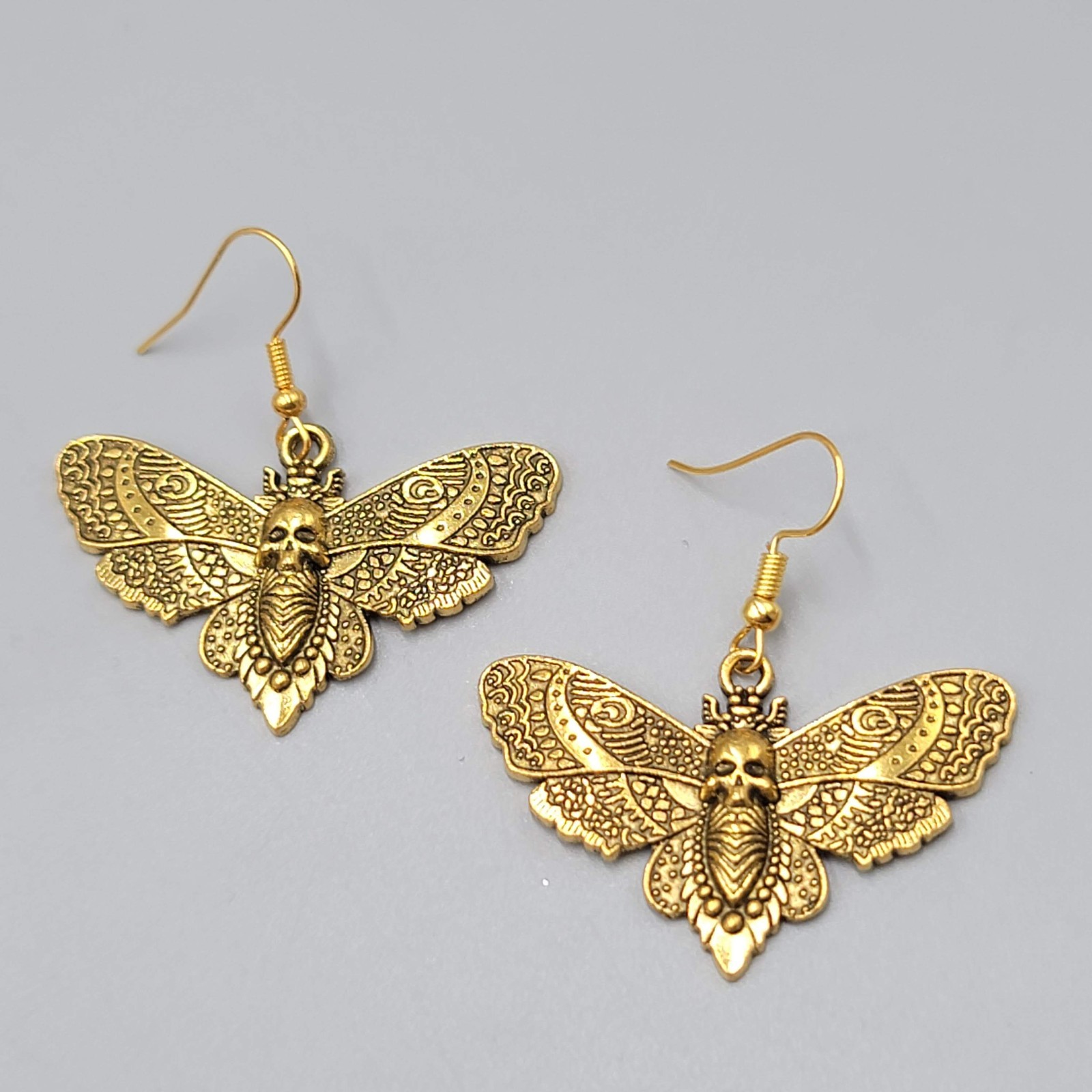 Moth Gold tone Embossed Pierced Earrings Dangle Goth Rock Punk 1 5/8″ x 1 in
