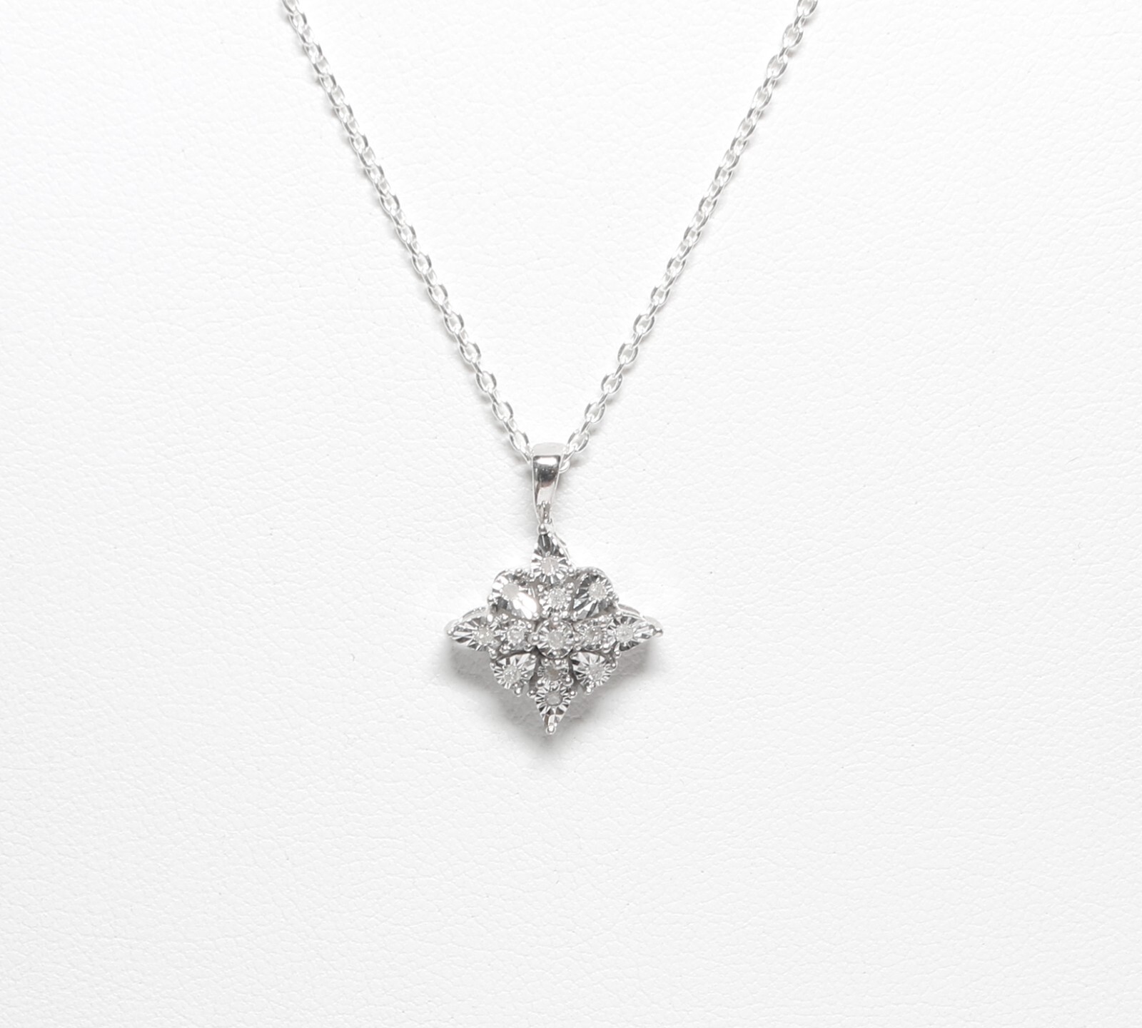 Sterling Silver .10ct TW Natural Diamond Pendant w/18″ Sterling Cable Chain