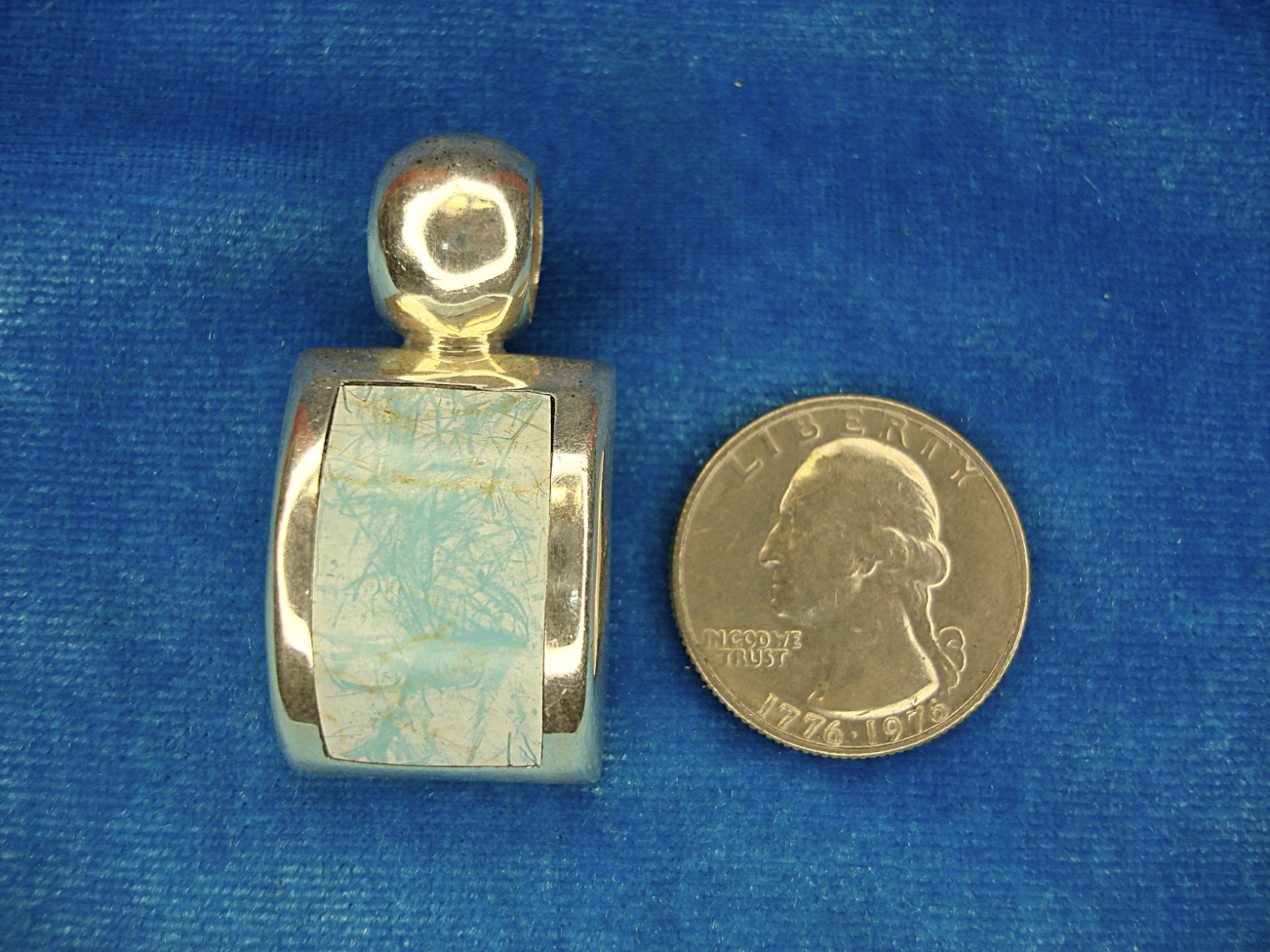 ATI MEXICO STERLING SILVER PENDANT WITH CURVED SETTING & BLUE/WHITE INSERT