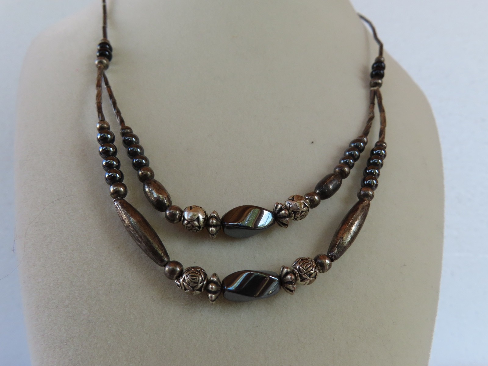 Black Beaded necklace, measures 18″ about.