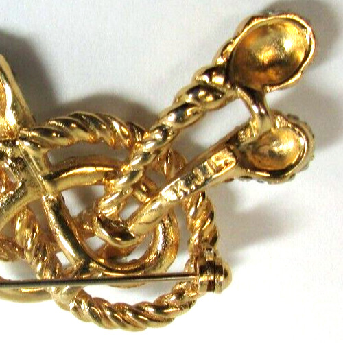 KJL KENNETH JAY LANE Pave’ Crystal Embellished Knot Gold Tone Pin Brooch