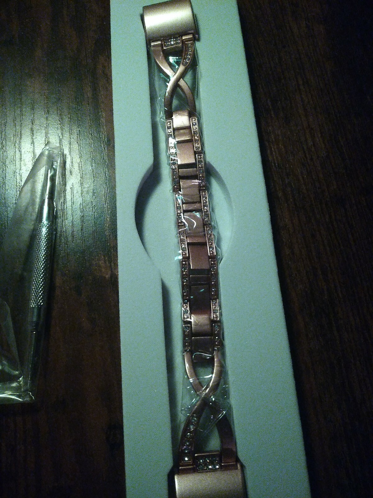 Pink metal smartwatch band. Not sure which one it’s for though.