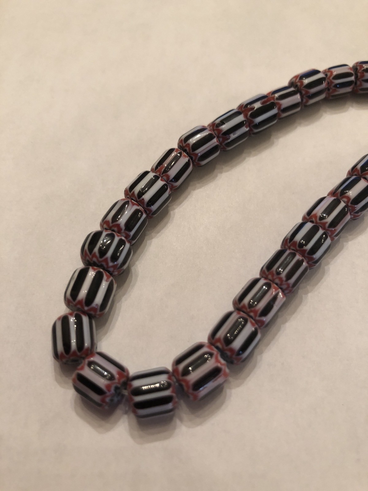 Vintage Red, White & Black Six Layer Glass Chevron Barrel Bead Strand