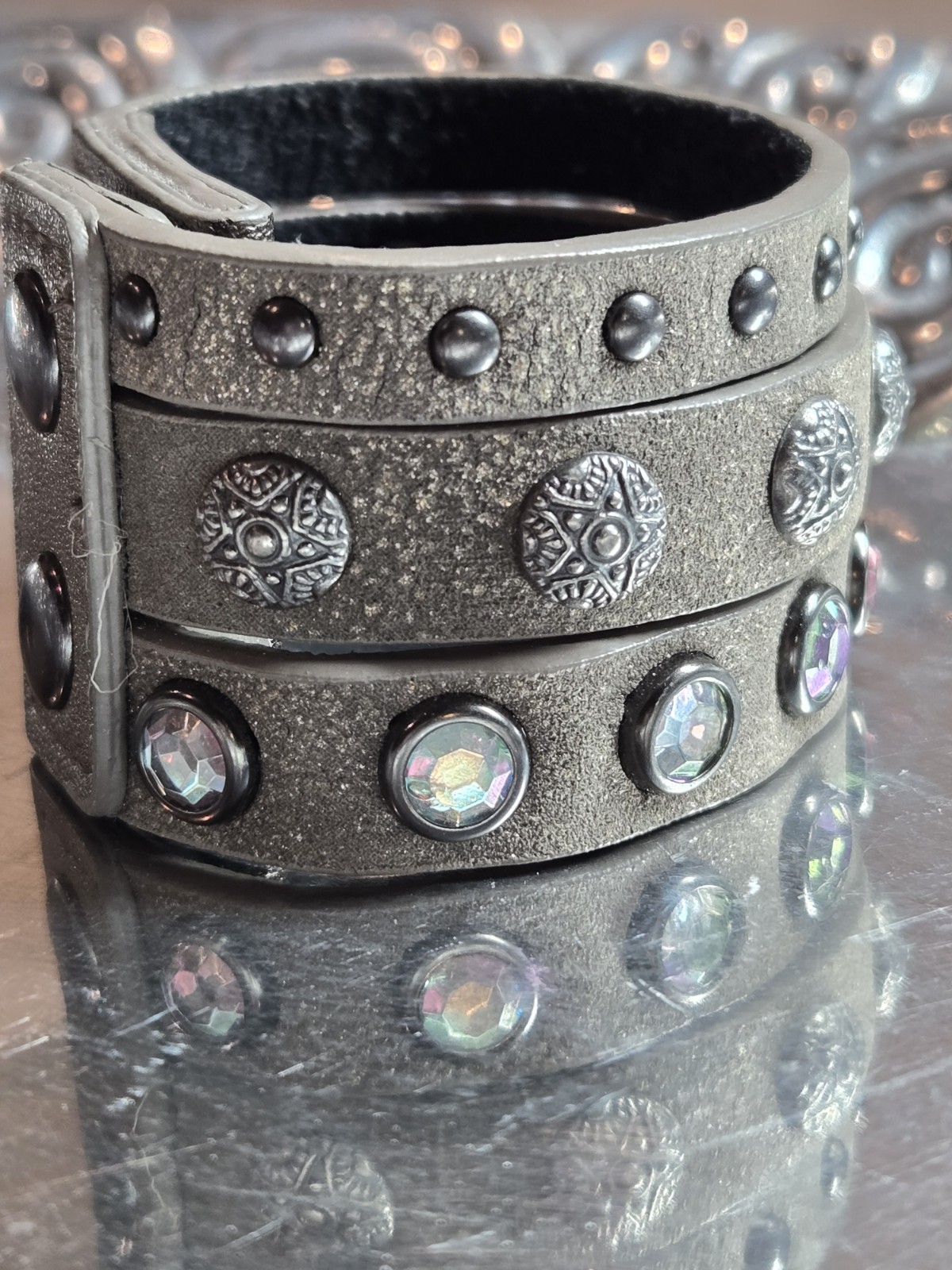 Rhinestone Studded Metal Leather Triple Band Cuff. Snap closure with 2 fittings