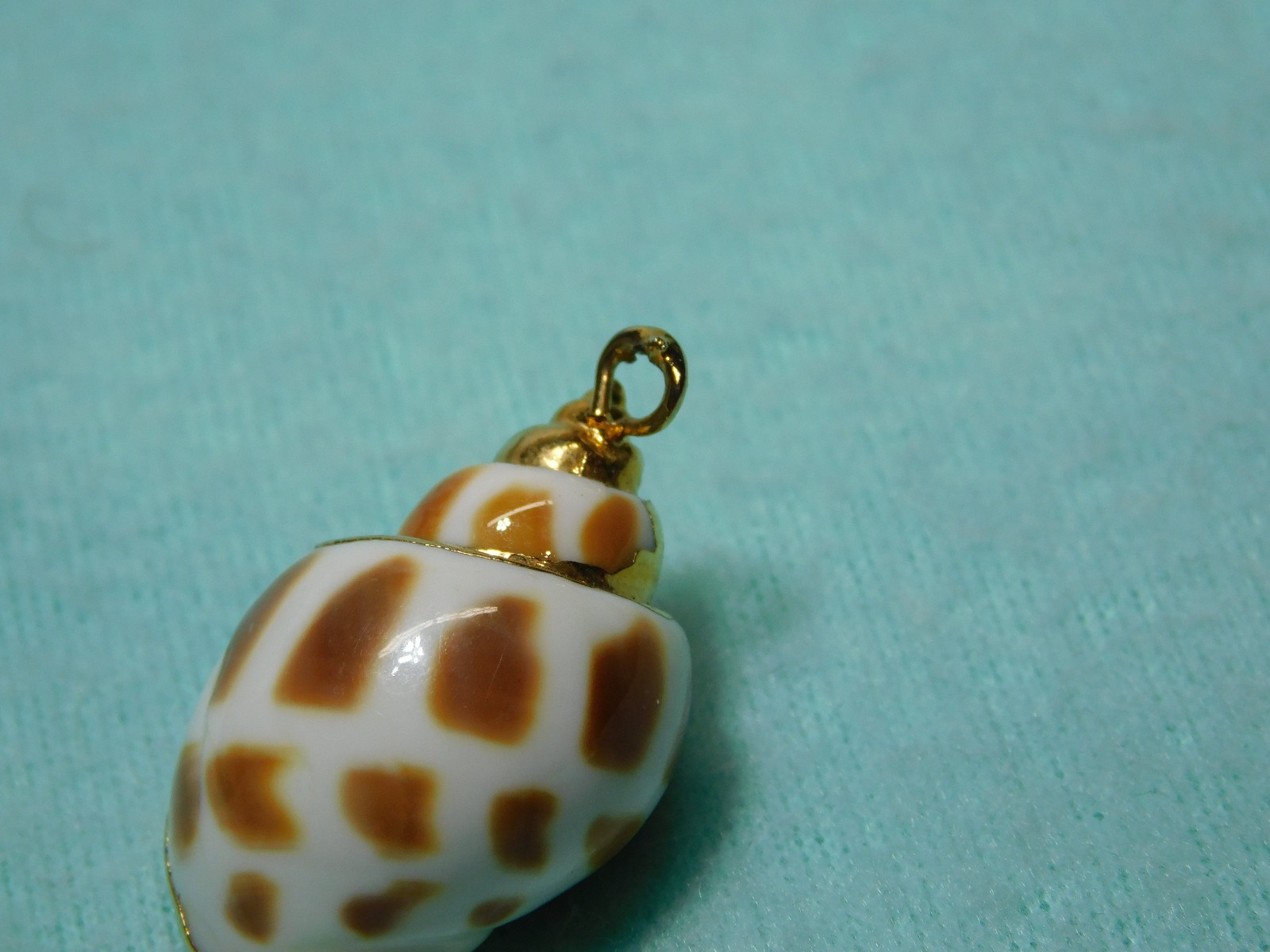Vintage 1 1/4″ Seashell With Gold Color Trim Pendant in Very Good Cond.