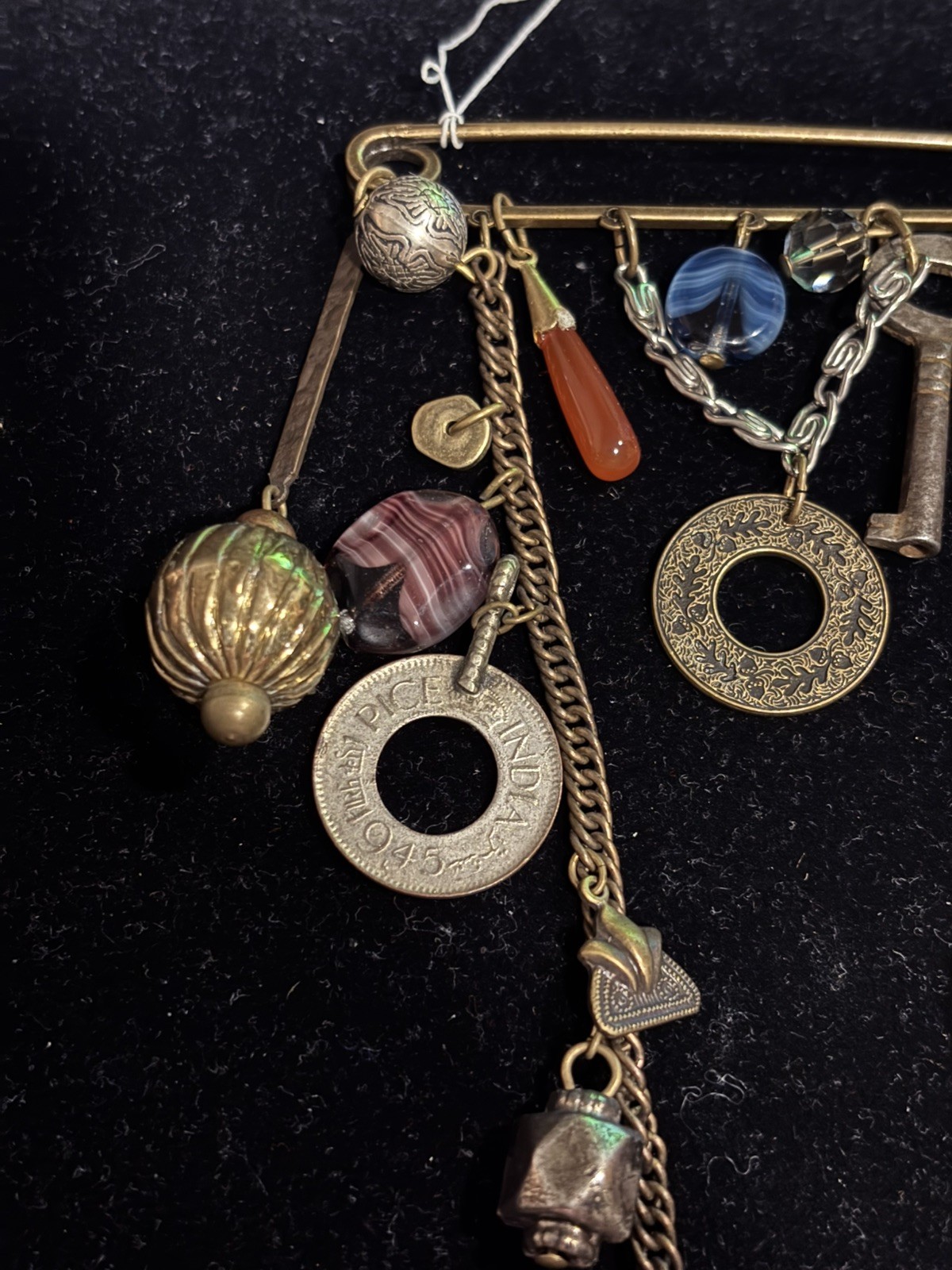 Ann Cichon Safety Pin Brooch with Gemstones and Metal Charms Bronze Tone