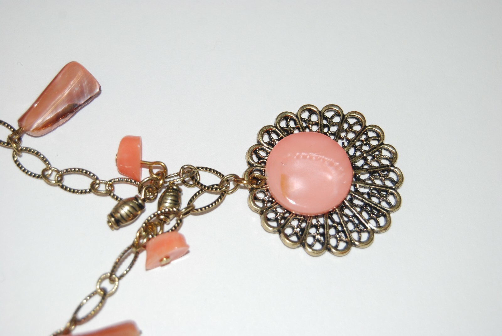 Gold Toned Metal Chain With Peach Color Stones & Charms Statement Long Necklace